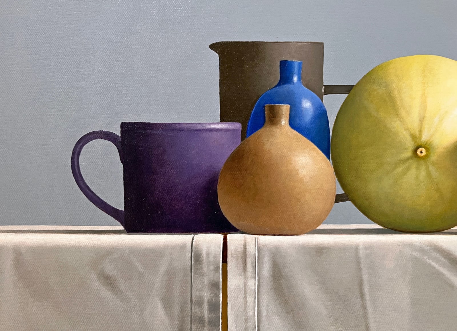 Mugs and pottery before two melons