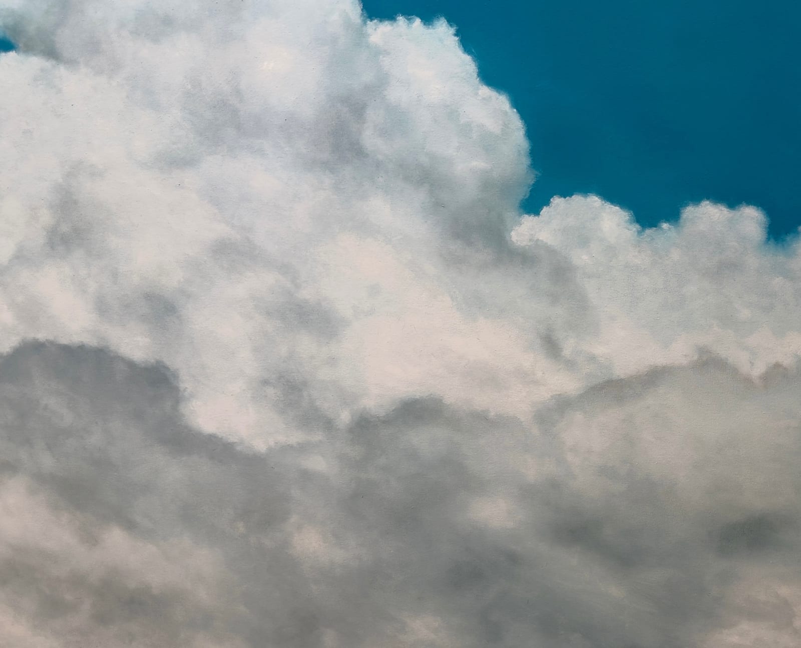 Painting of clouds and blue sky
