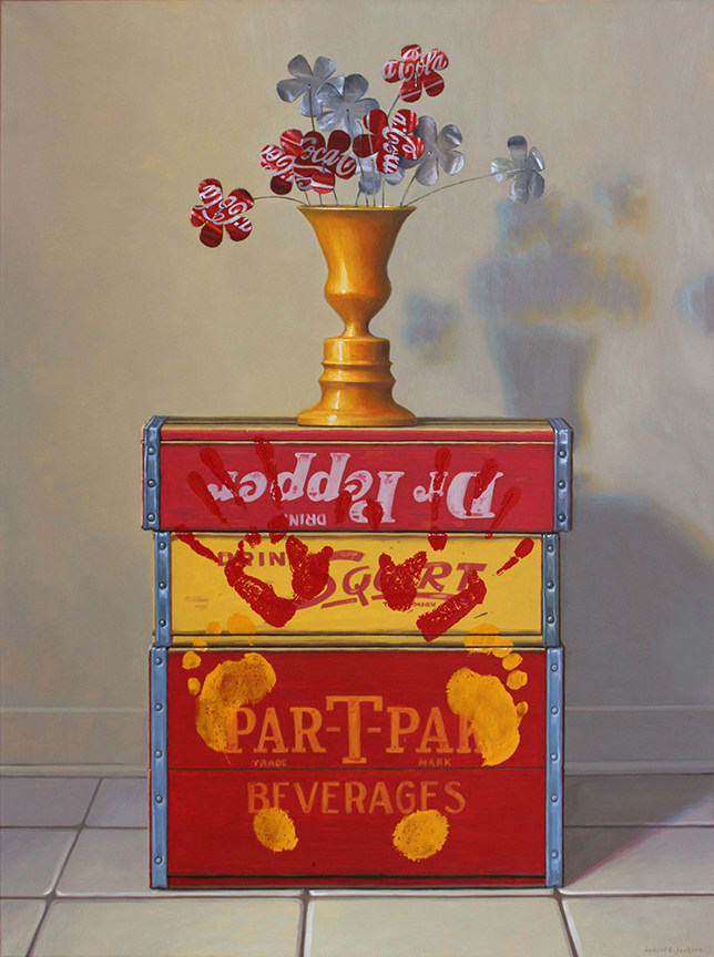Flowers made from Coca Cola cans on top of red and yellow soda boxes with hand and foot prints