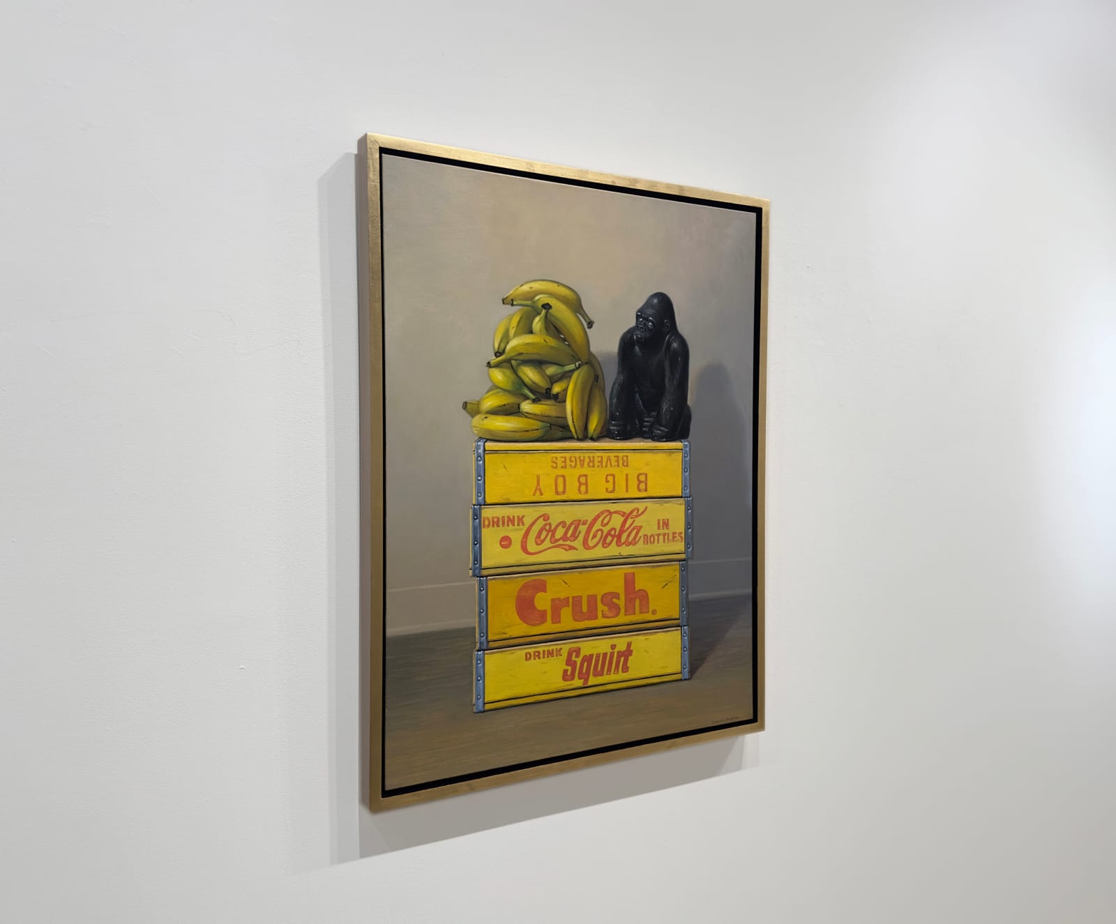 Still life painting of a gorilla with a pile of bananas on a stack of yellow crates