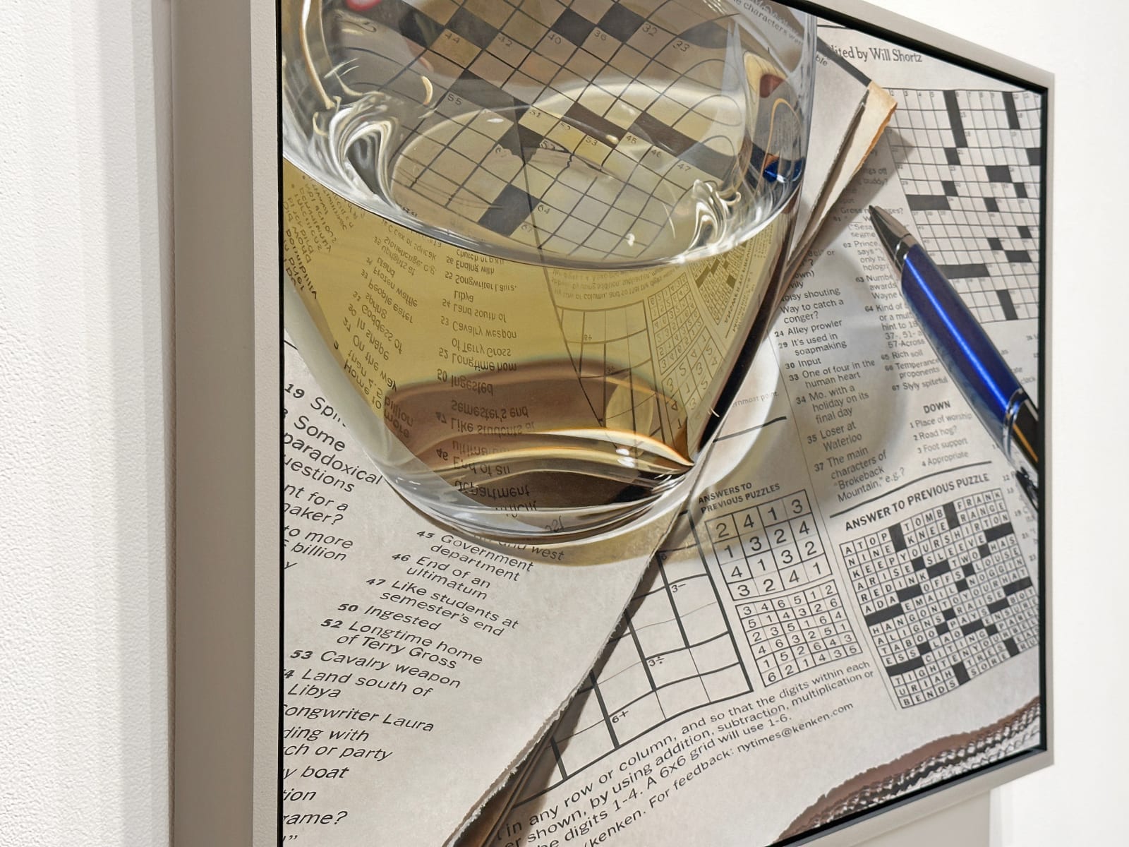 Photorealistic painting of pen, crossword puzzles, and glass of white wine