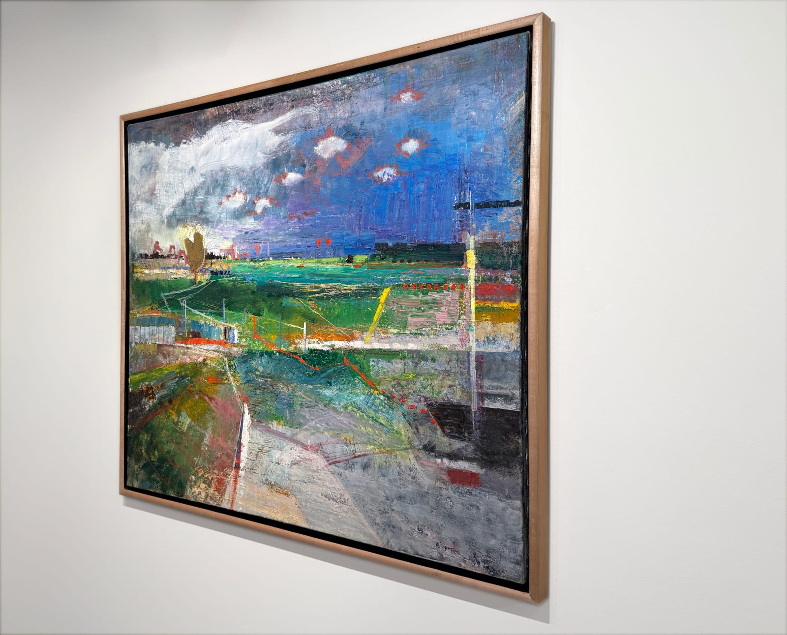 Painting of a beach and countryside landscape