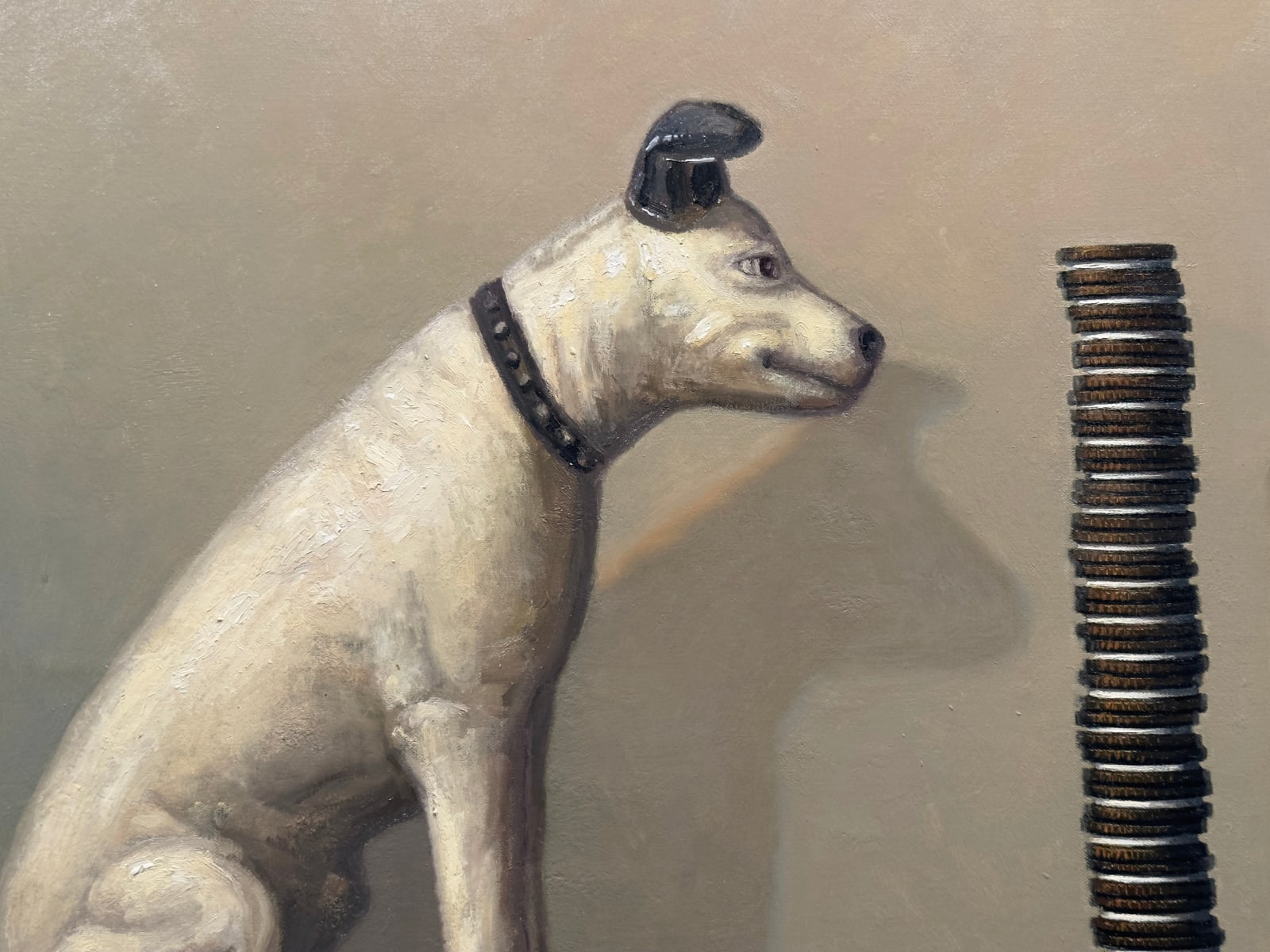 Dog figurine staring at oreo tower