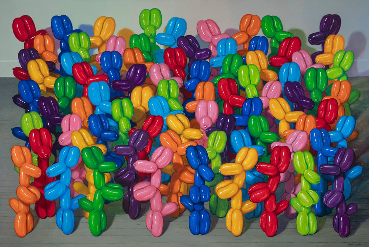 Multicolored balloon dogs gathered in a large group