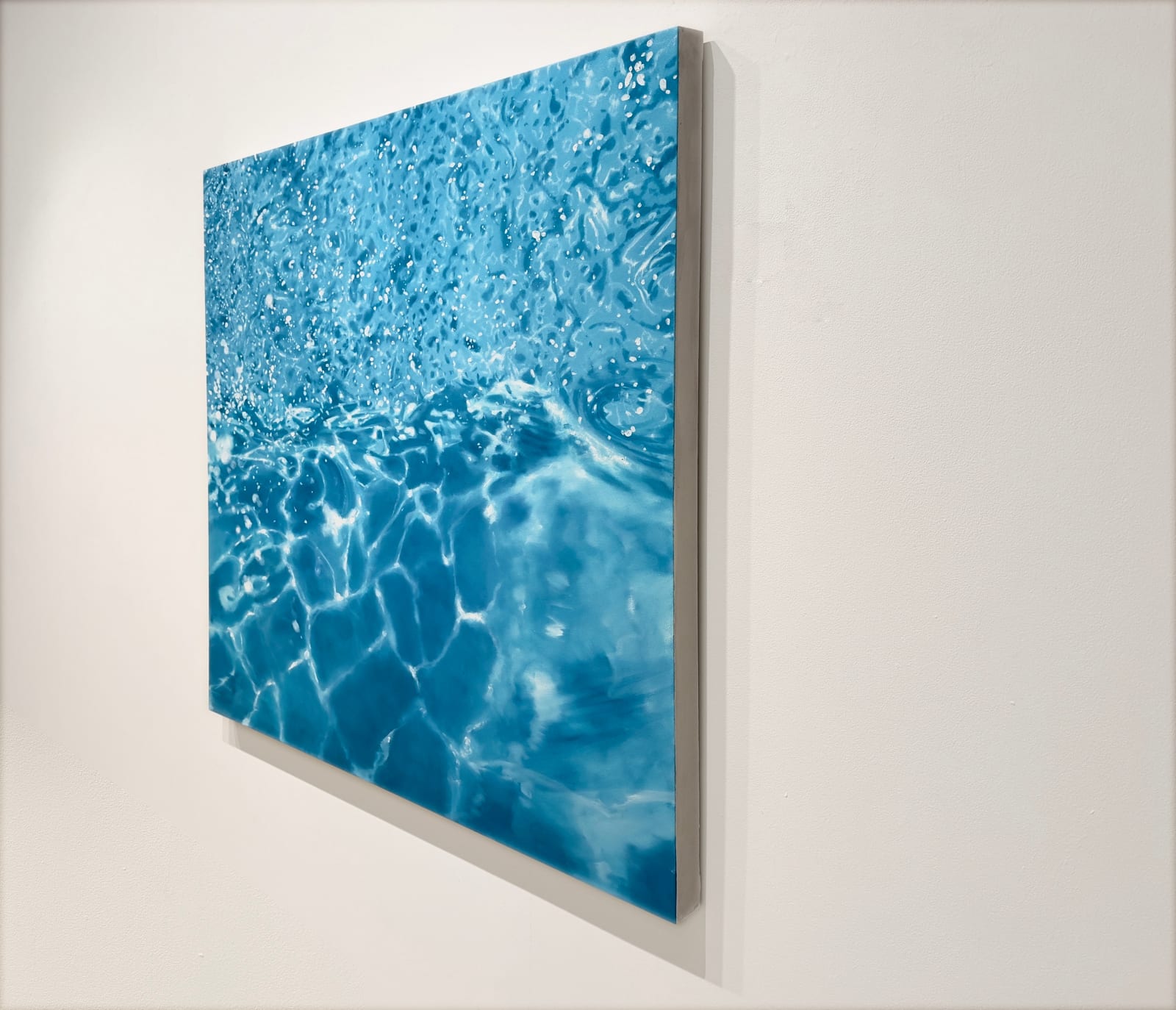 Painting of ripples on a pool