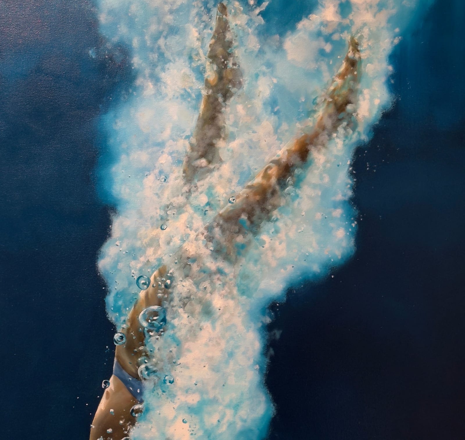 Painting of a woman diving down into water