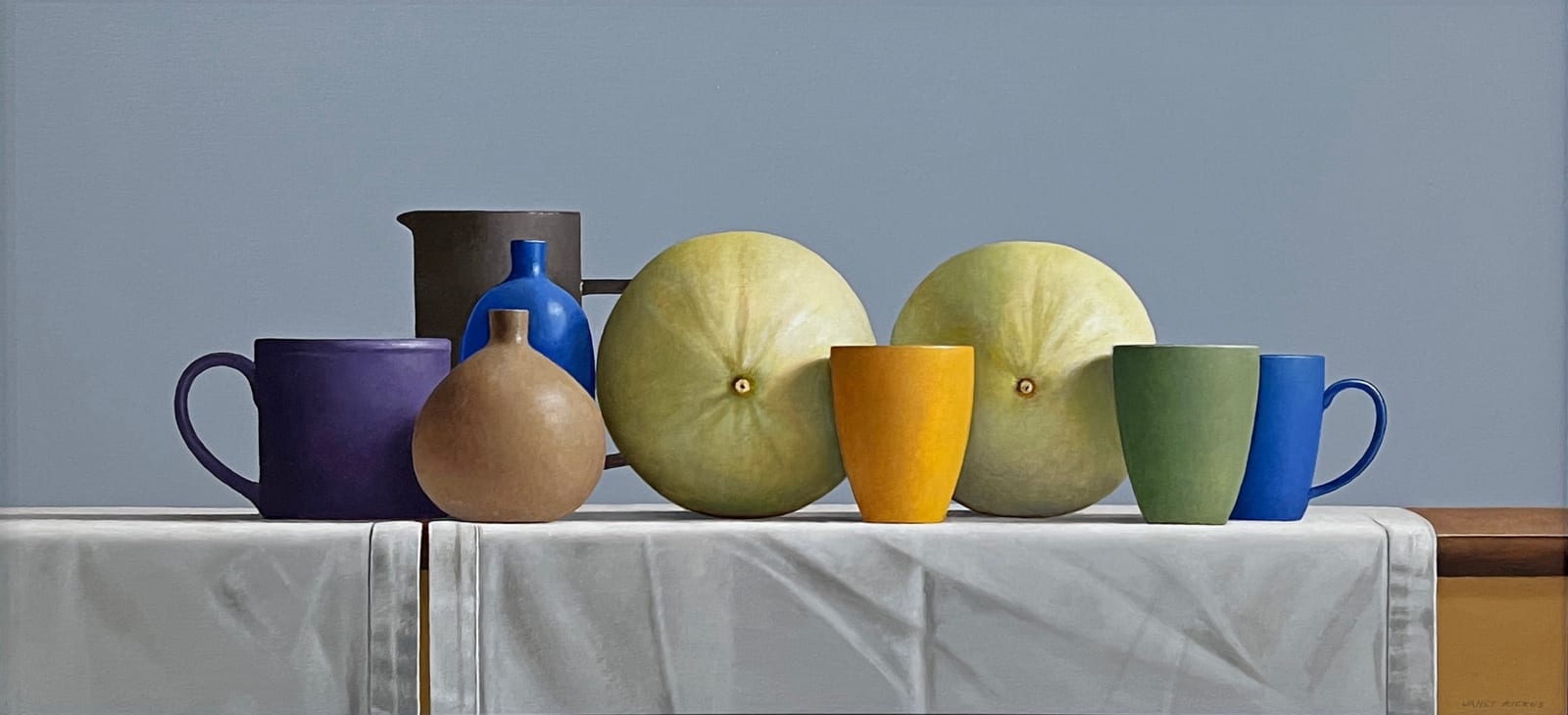 Mugs and pottery before two melons