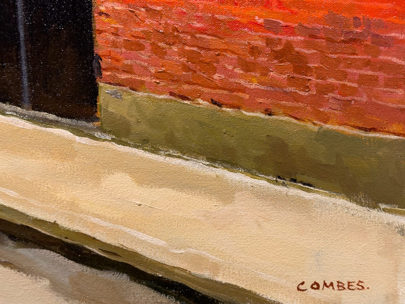 Painting of street scene with red brick buildings