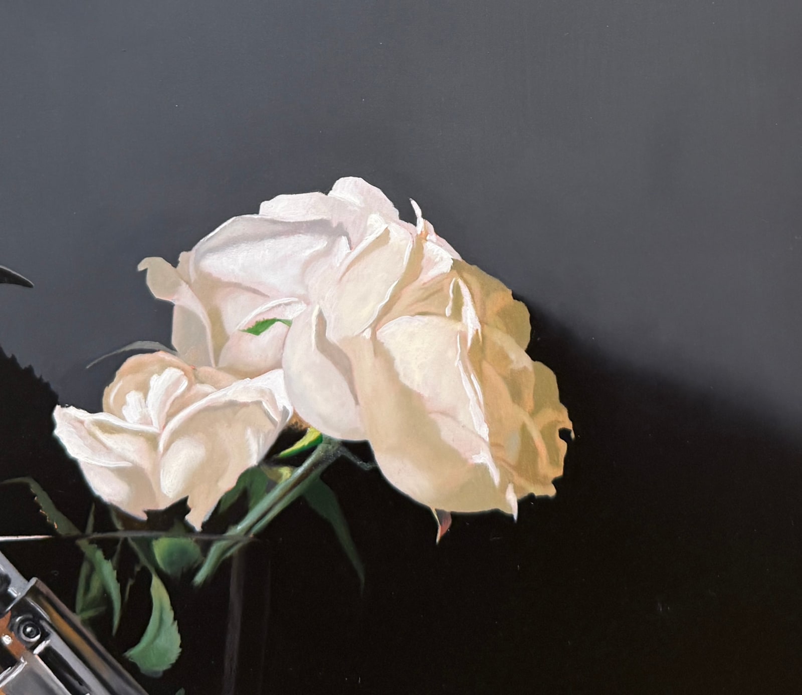 Still life painting of a vase with roses and a gun in it