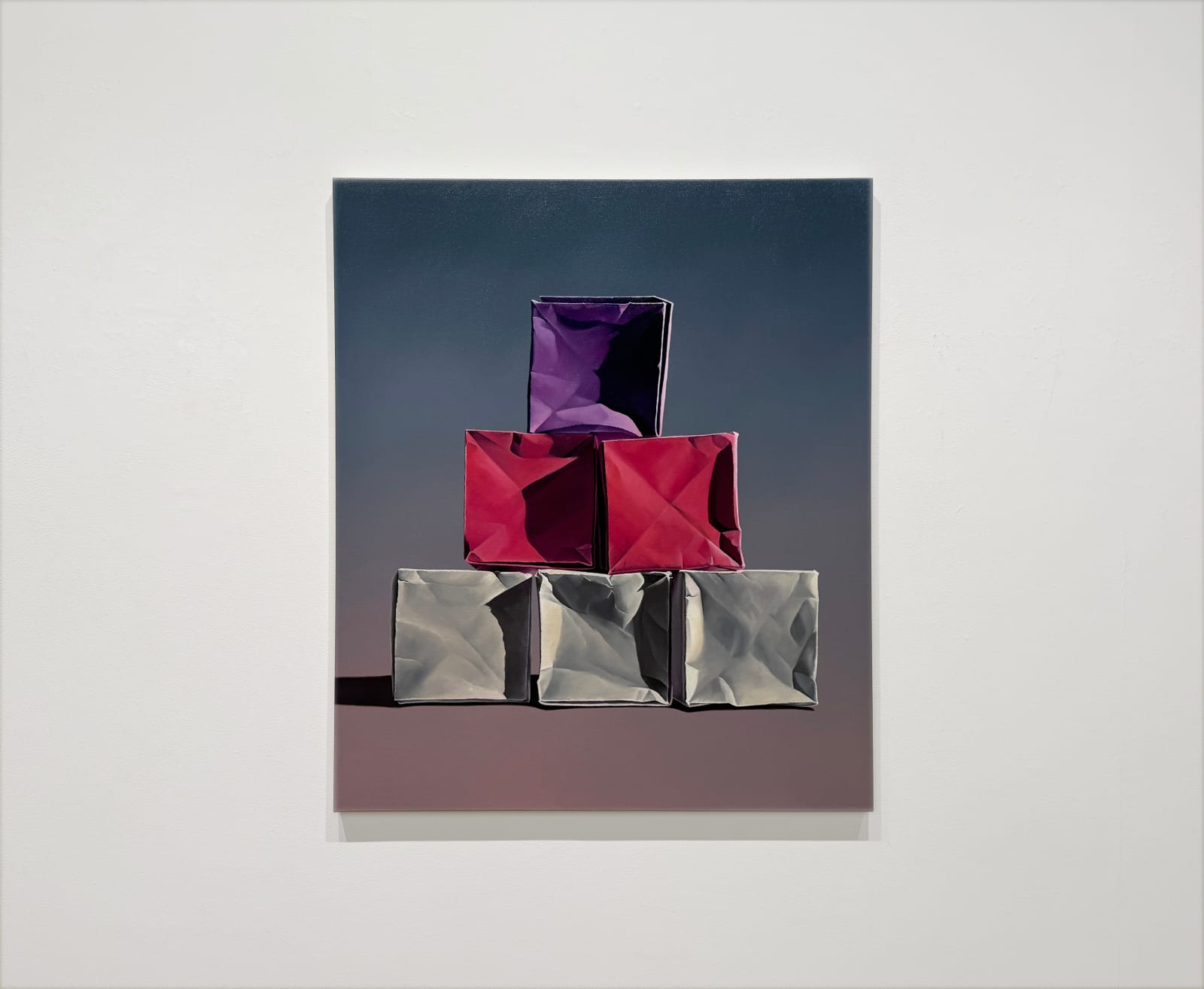 Colorful paper box pyramid on a warm background