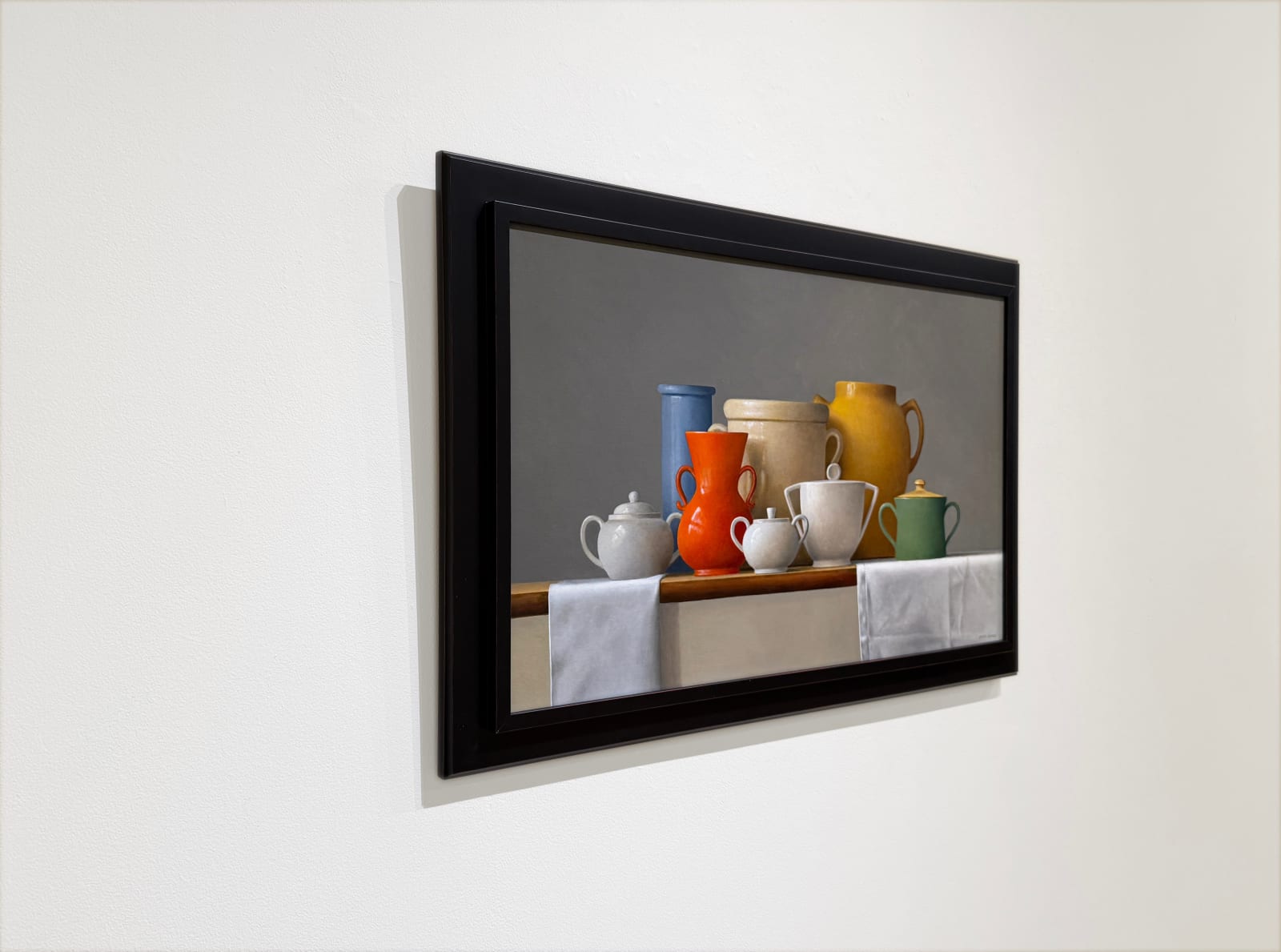 Painting of a still life with many handled vessels