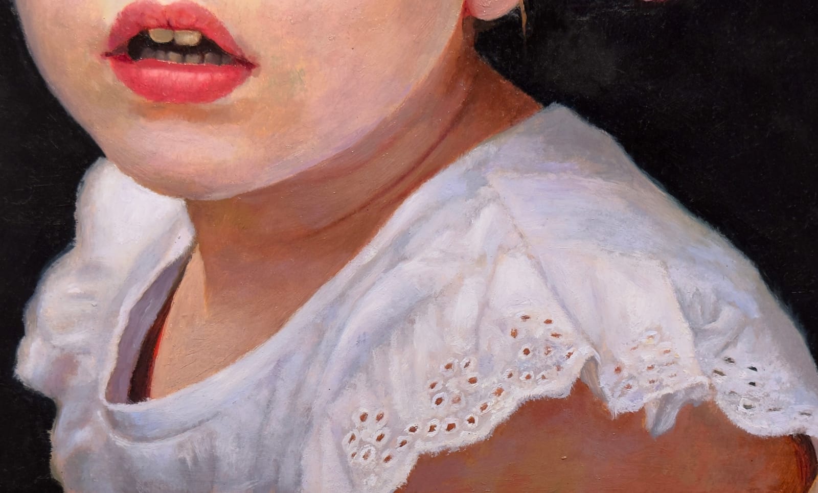 Portrait of a little girl with flowers in her hair