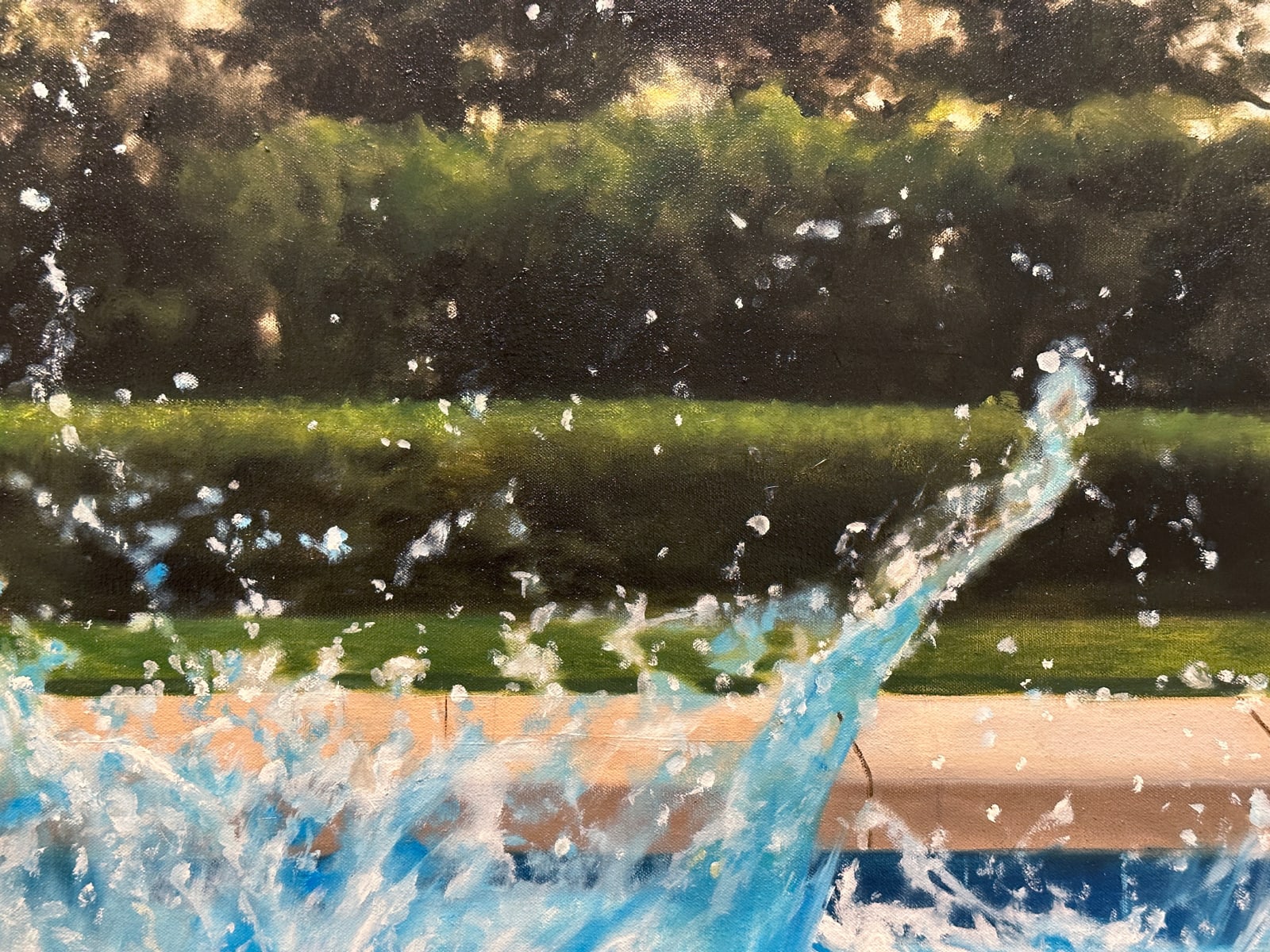 Big splash of water in a pool