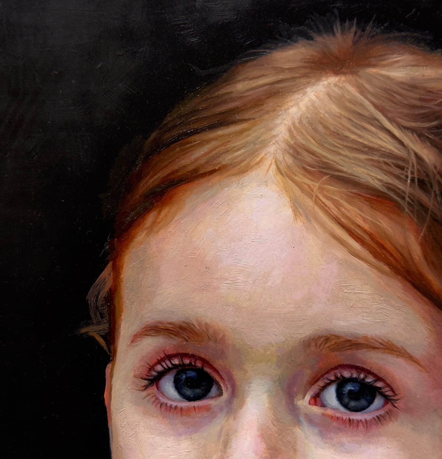 Portrait of a little girl with flowers in her hair