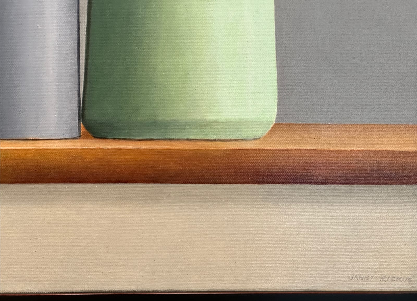 Blue and Yellow vessels on a table with a bird cup