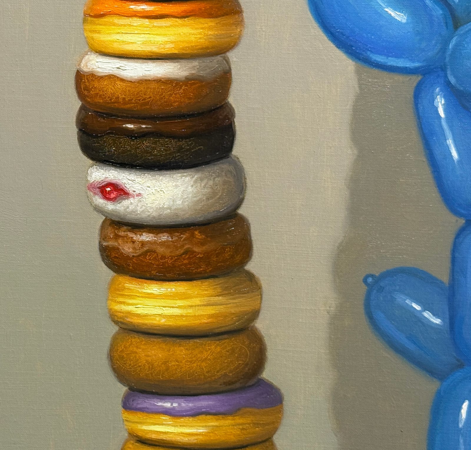 Painting of balloon dogs stacking donuts