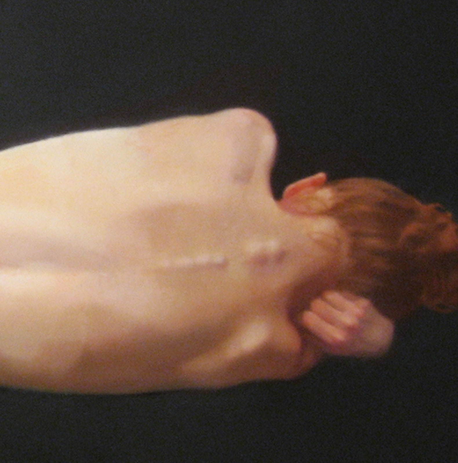 Oil painting of figure laying on side on panel