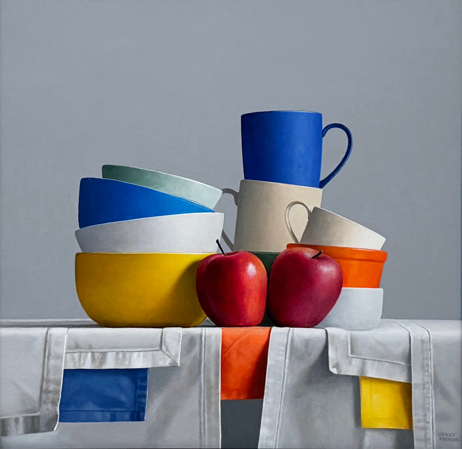 Still life of stacked bowls and two apples