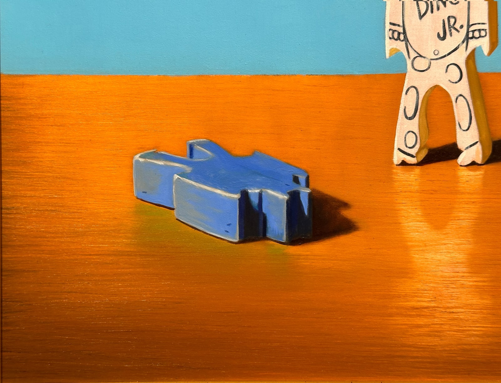 painting of wooden colorful toy block figurines