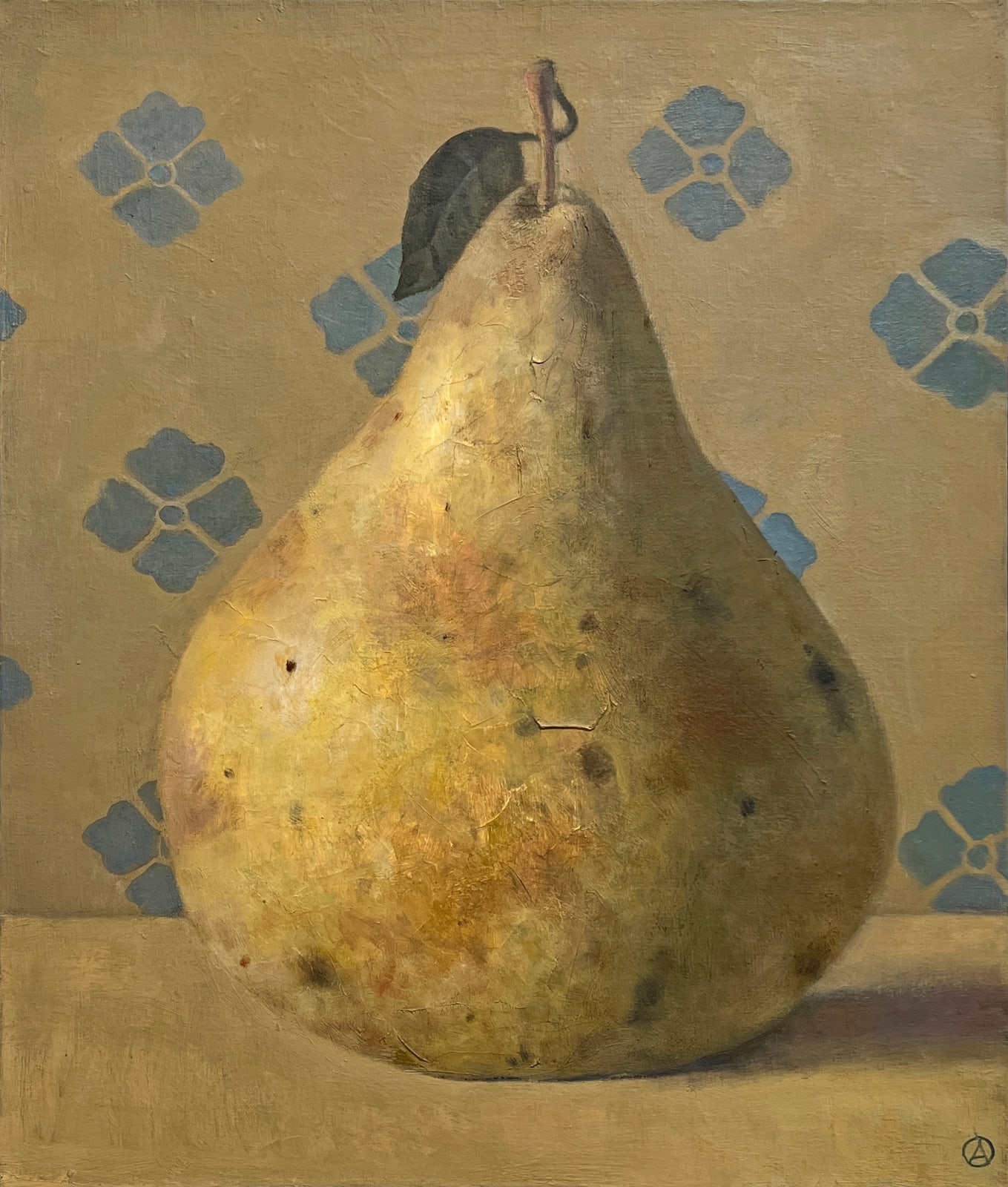 Pear sitting on table with blue design in background