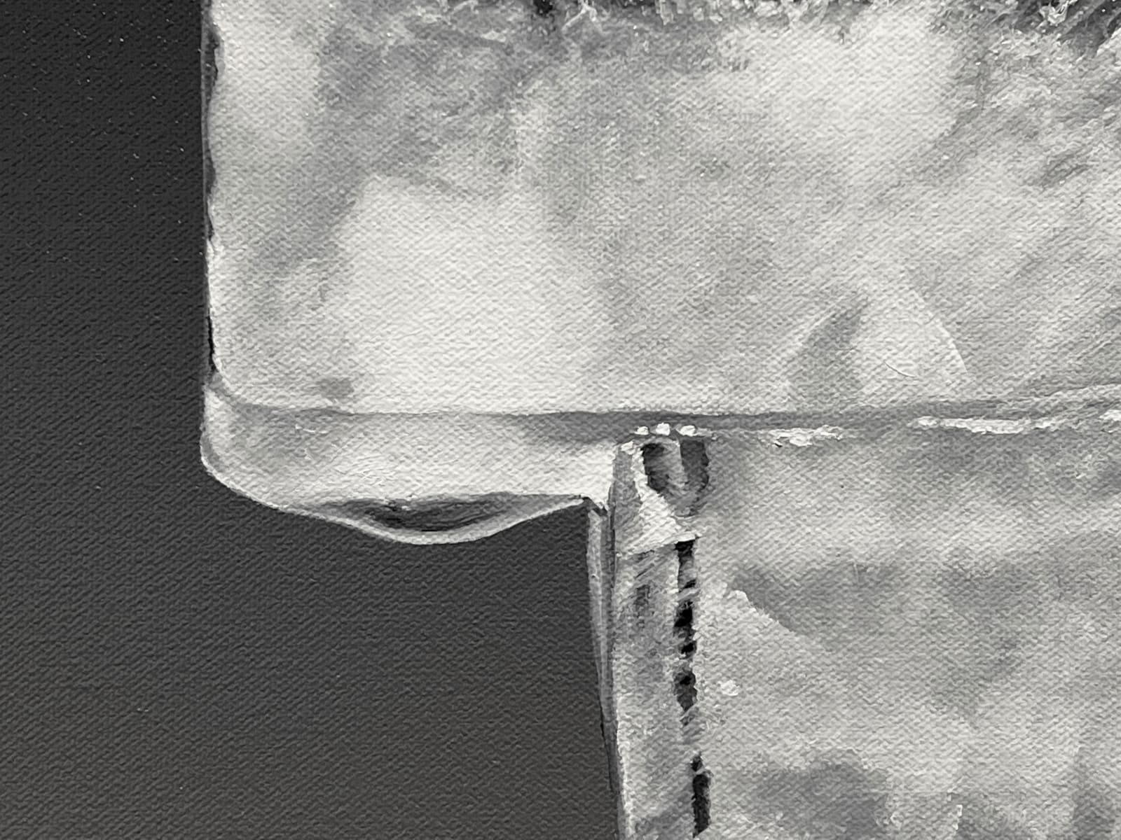 Detail of 3 ice cubes stacked off center with a reddish dark background