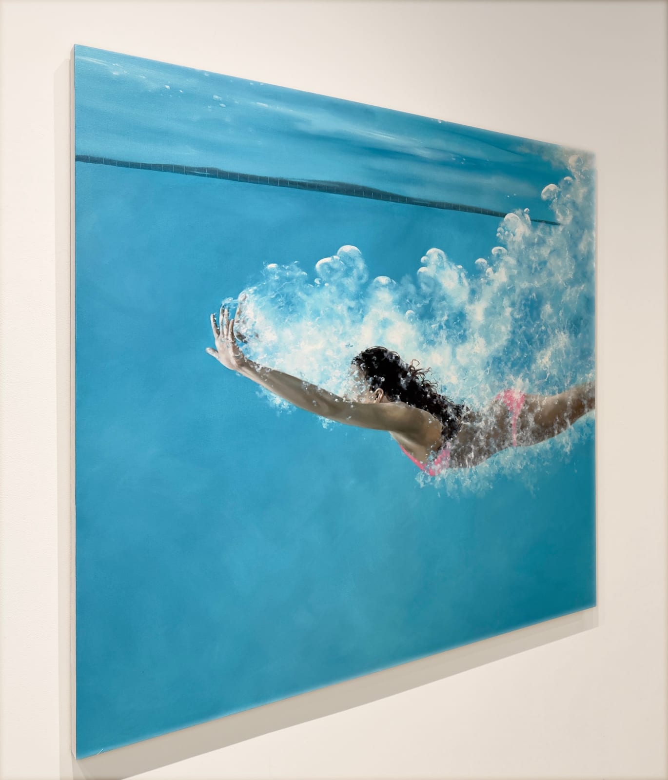 Painting of a woman in a pink bathing suit swimming