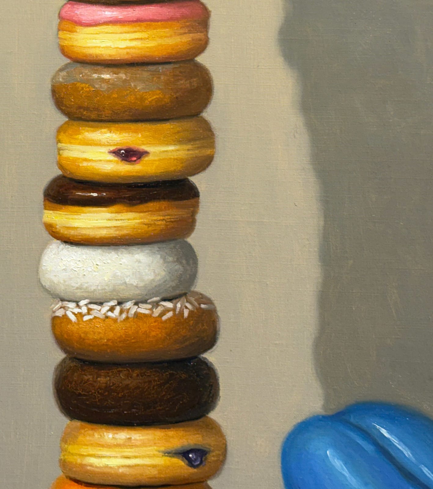 Painting of balloon dogs stacking donuts