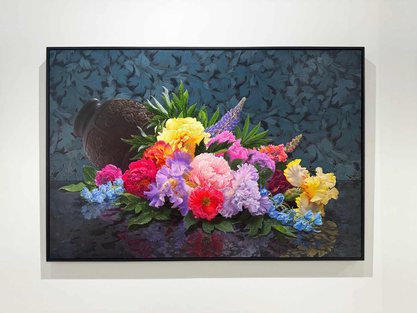 Painting of flowers spilling out of a vase