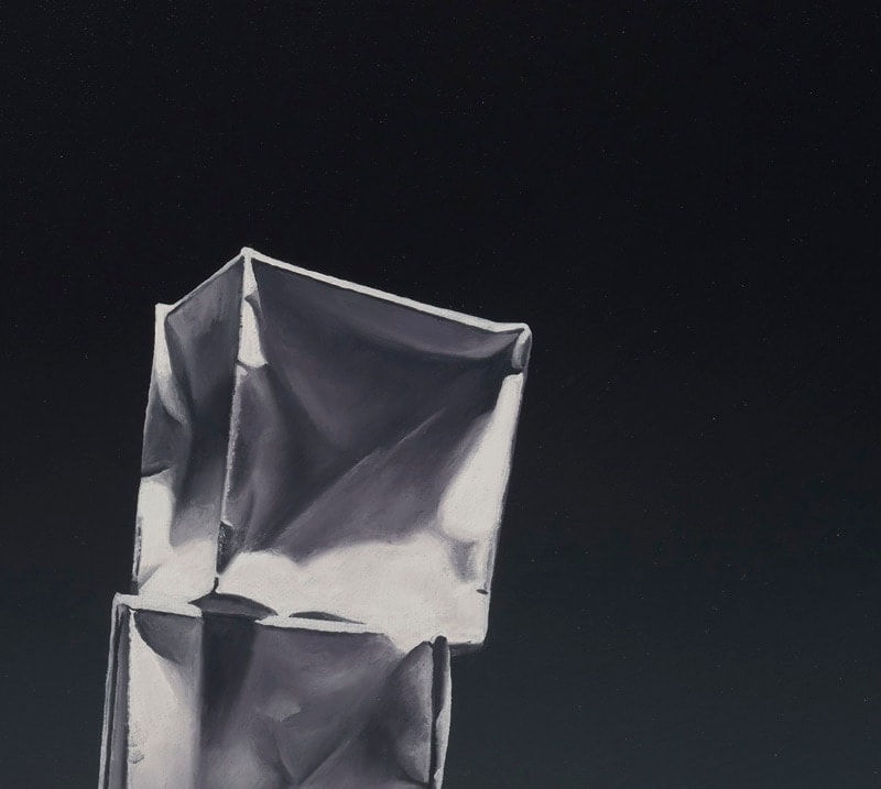 Detail of Right leaning stack of paper origami boxes before a teal and black background