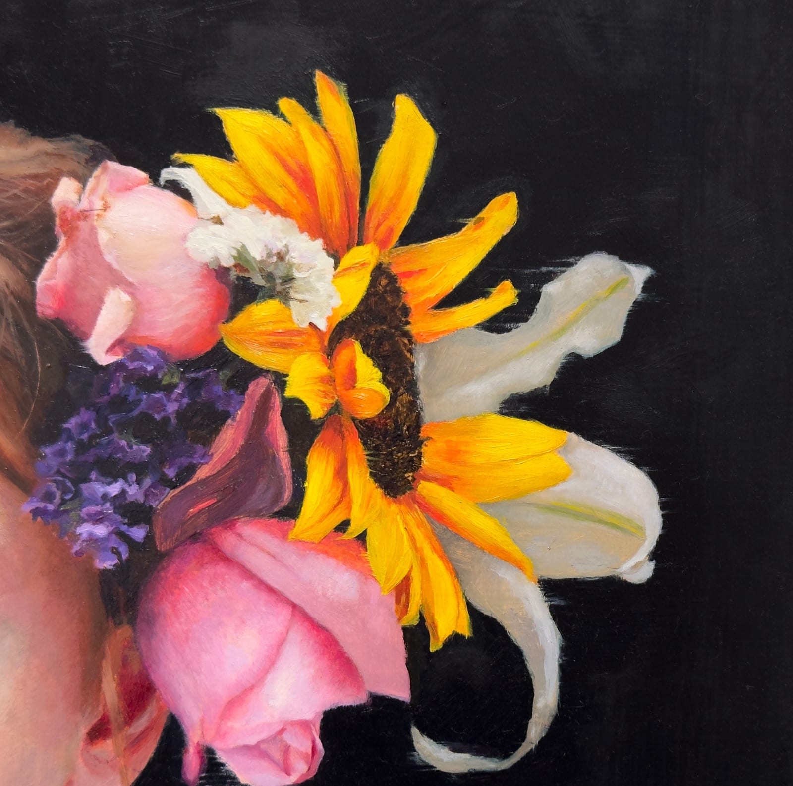 Portrait of a little girl with flowers in her hair