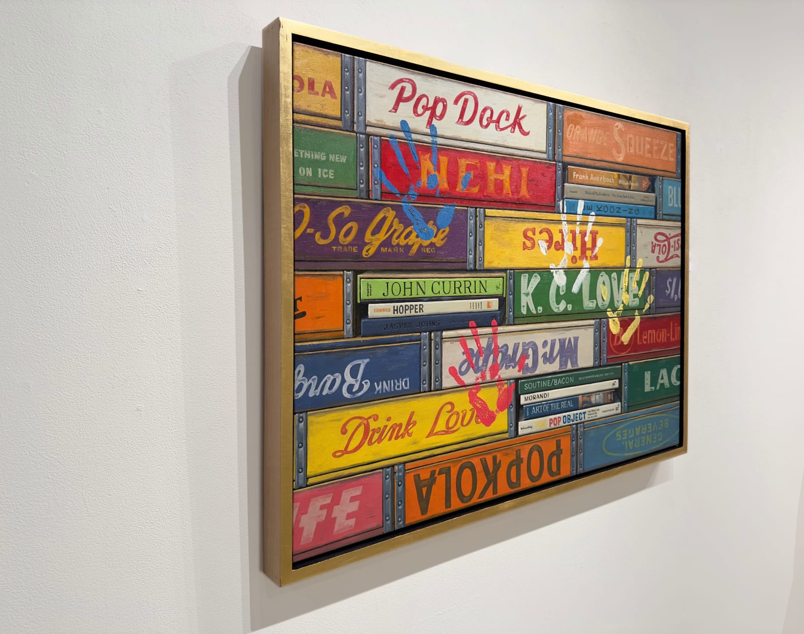 4 hand prints on colored soda boxes