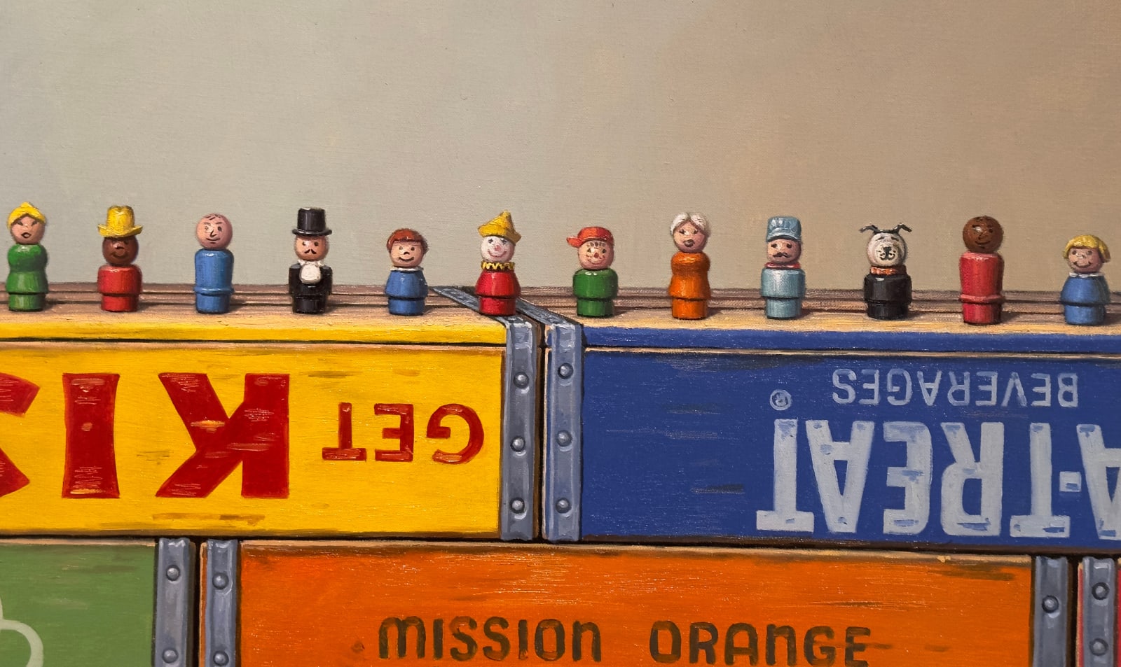 Painting of toy figurines on colorful crates