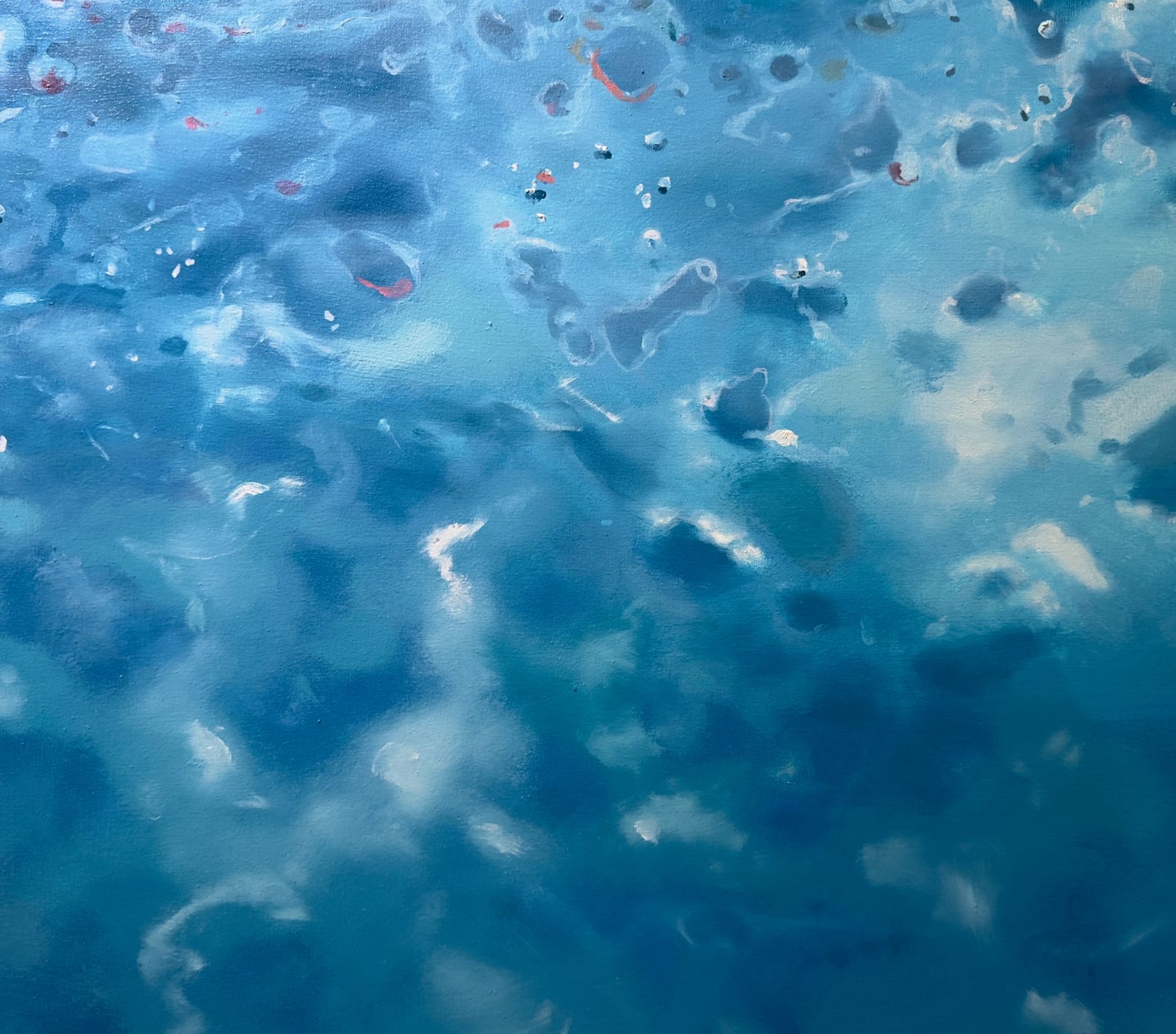 Painting of a woman on her back swimming