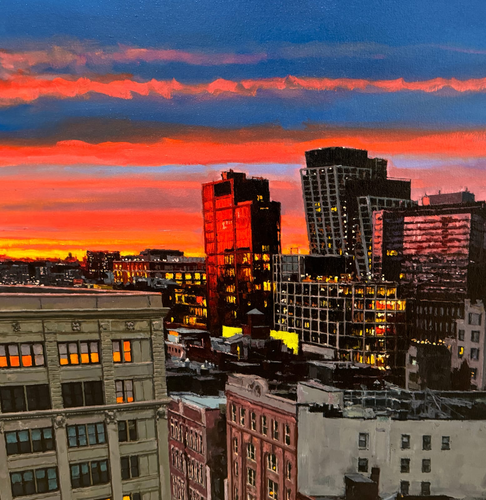 Colorful sunset over Manhattan buildings
