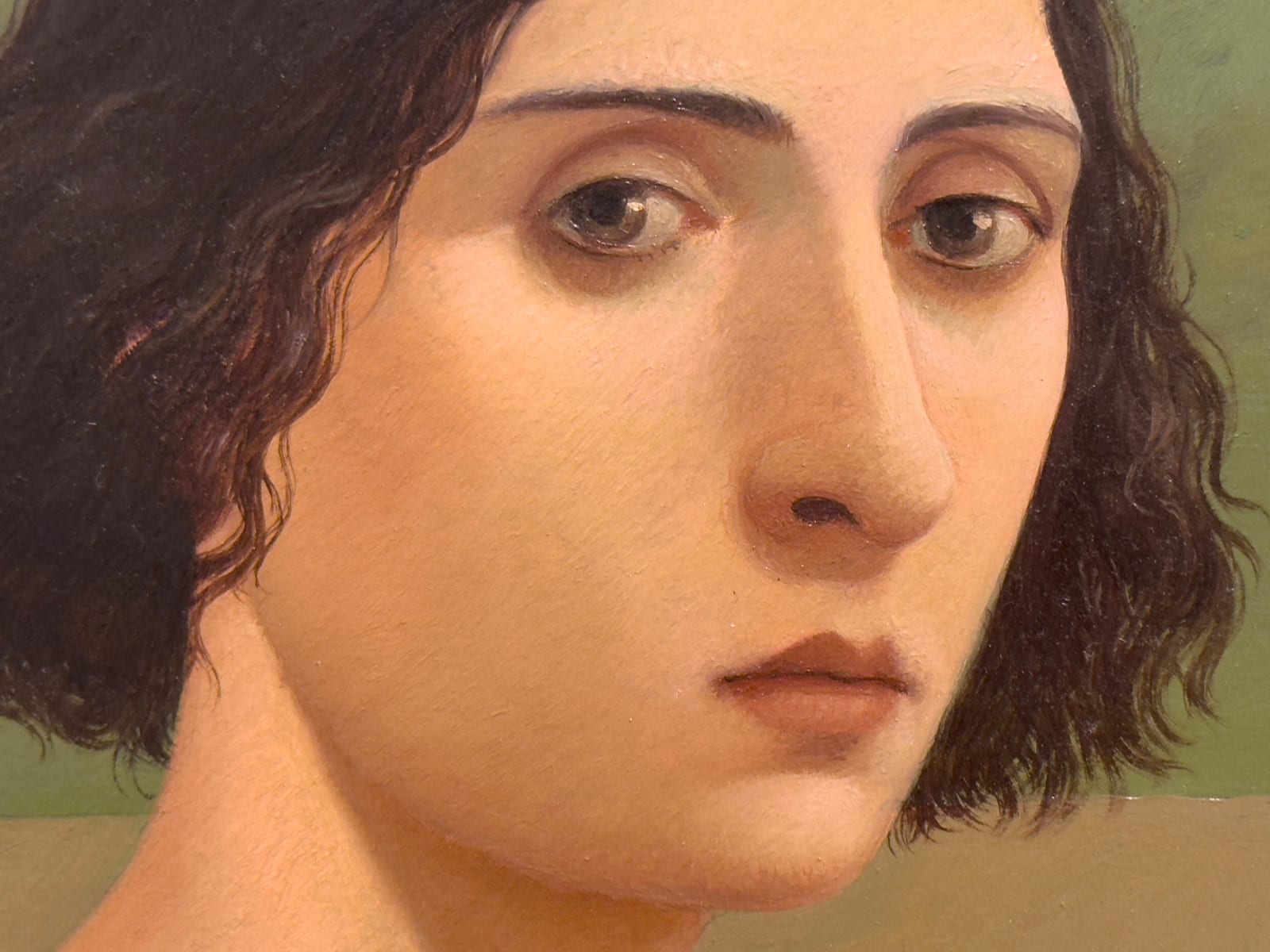 Portrait of a Dark Haired White Woman in front of a landscape