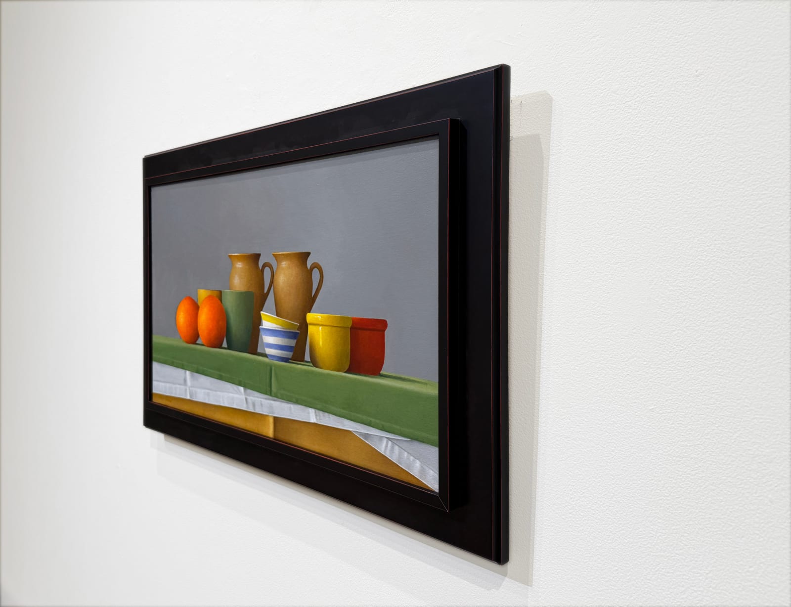 Still life painting with vessels and oranges