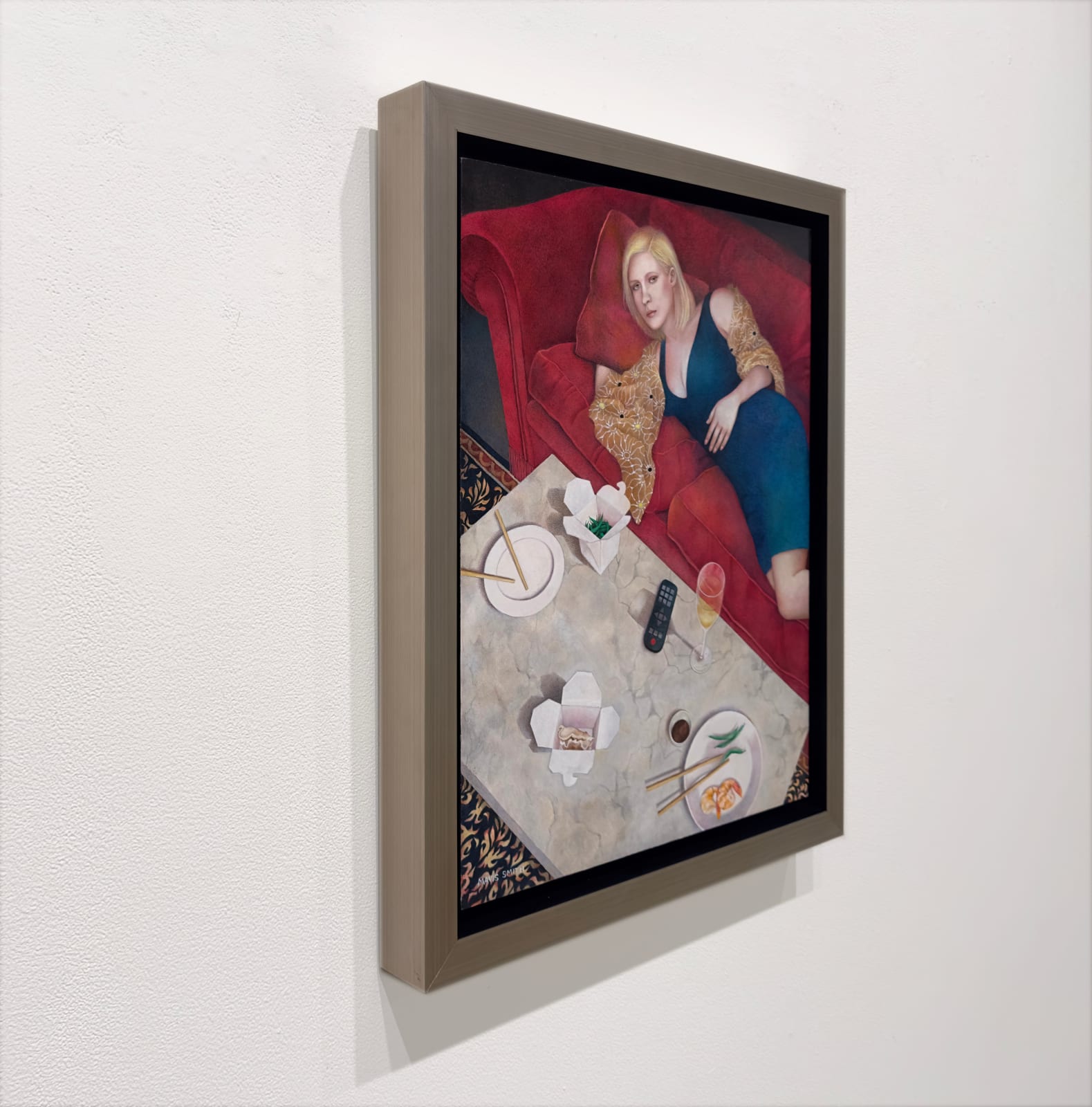 Painting of a woman laying on a couch