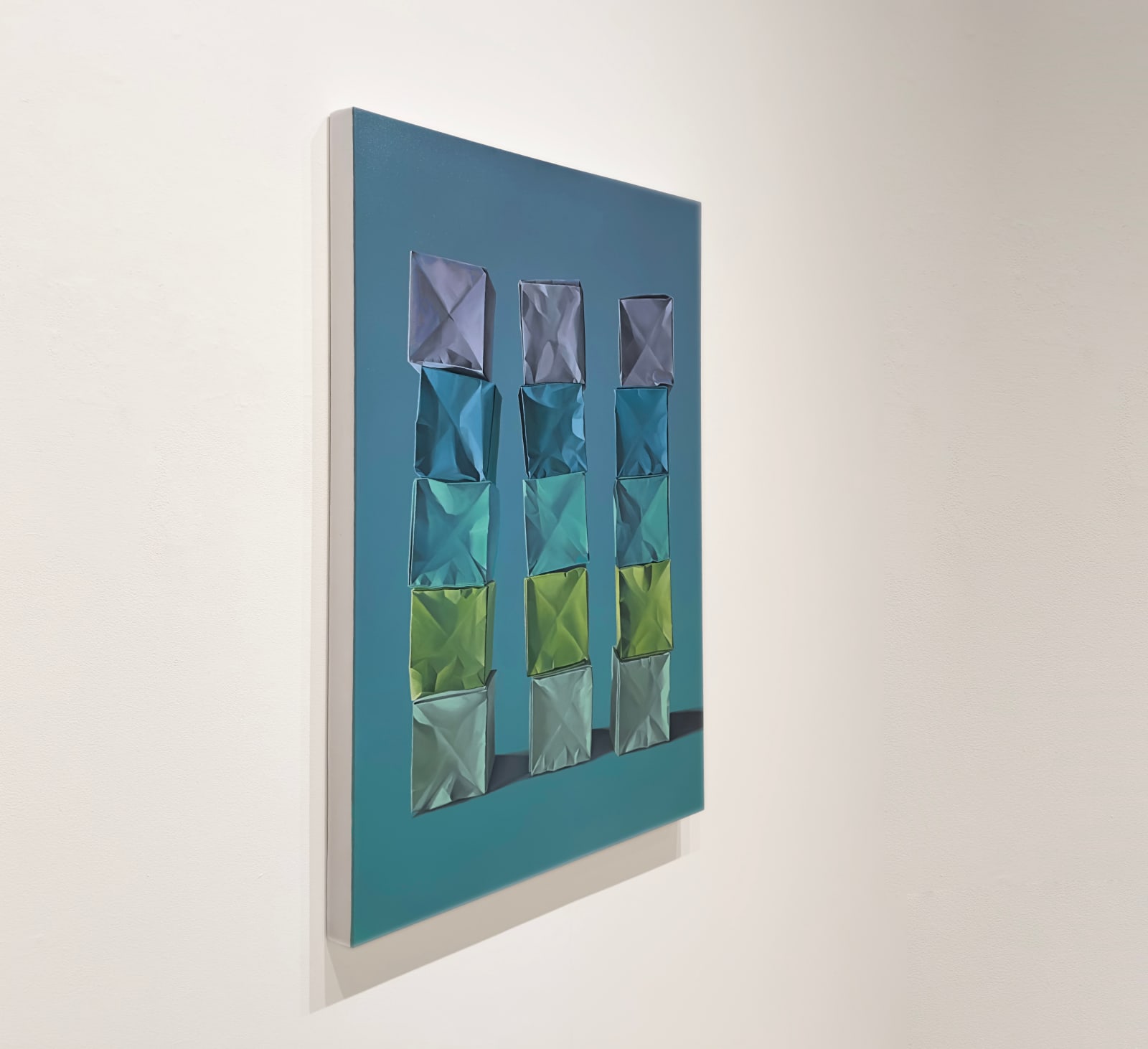 Painting of stacks of colorful paper origami boxes