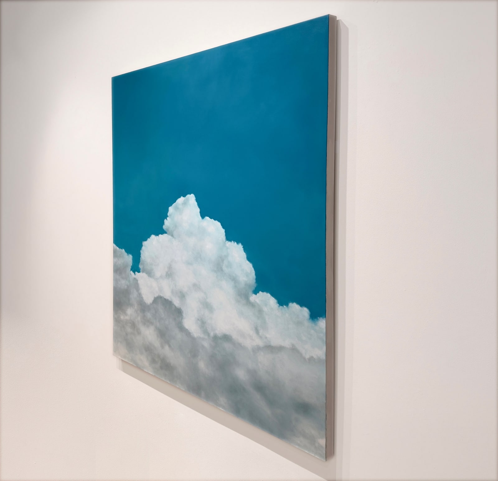 Painting of clouds and blue sky