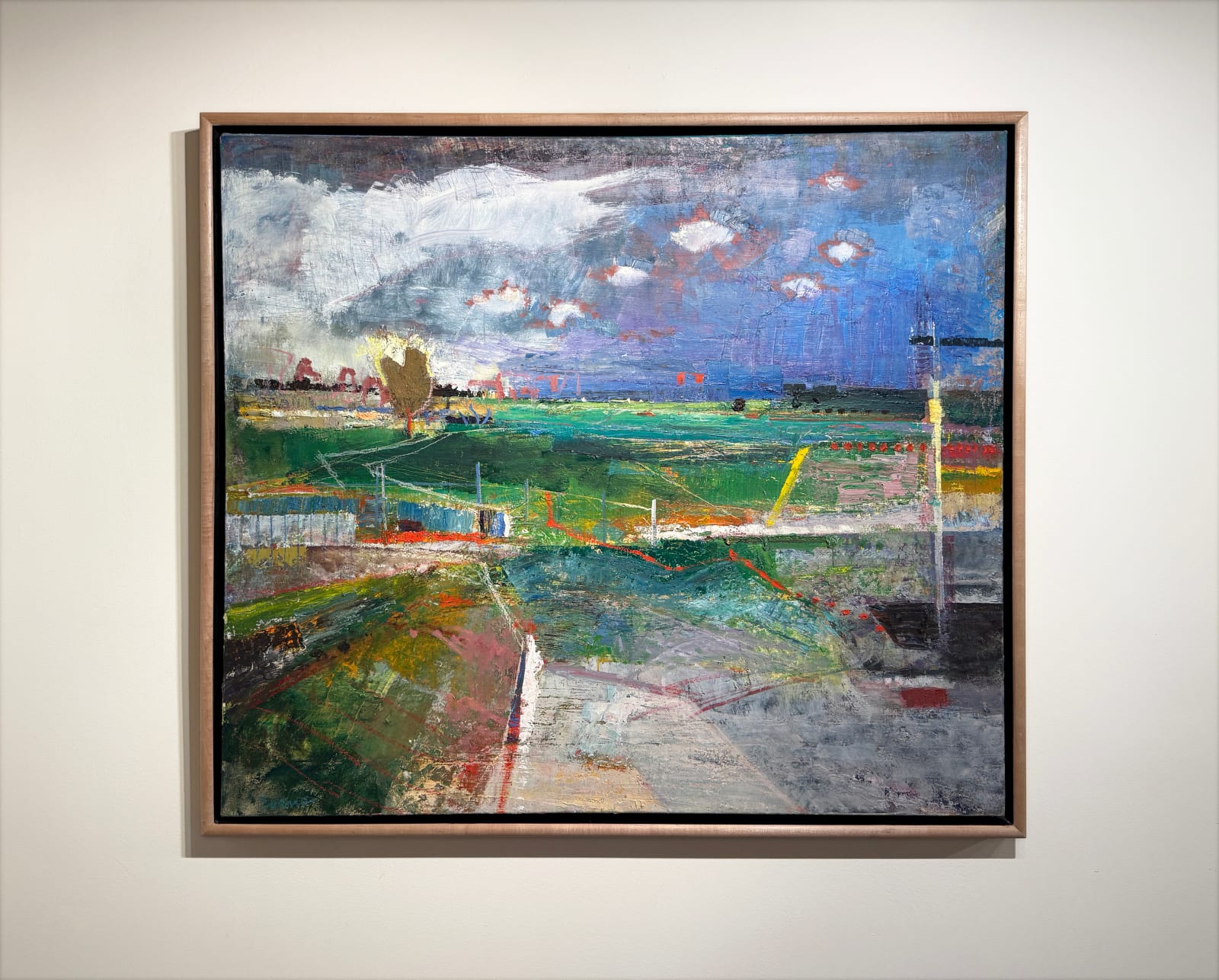 Painting of a beach and countryside landscape