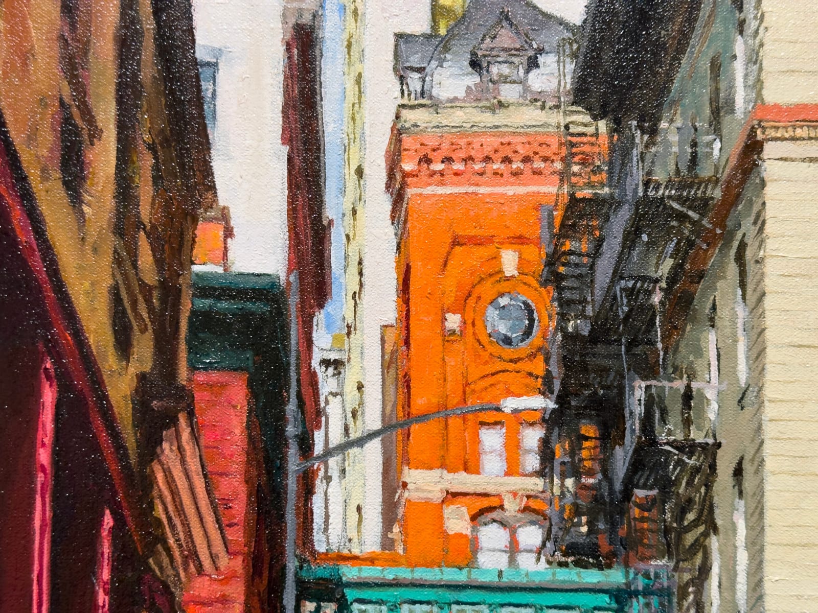 Painting of street scene with red brick buildings