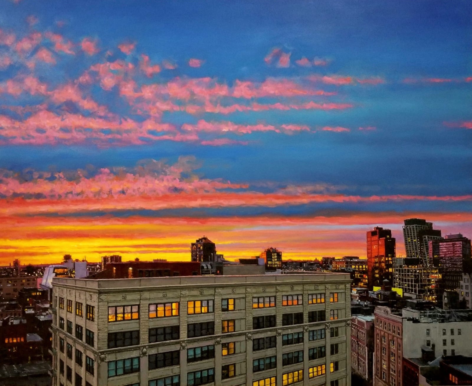 Colorful sunset over Manhattan buildings
