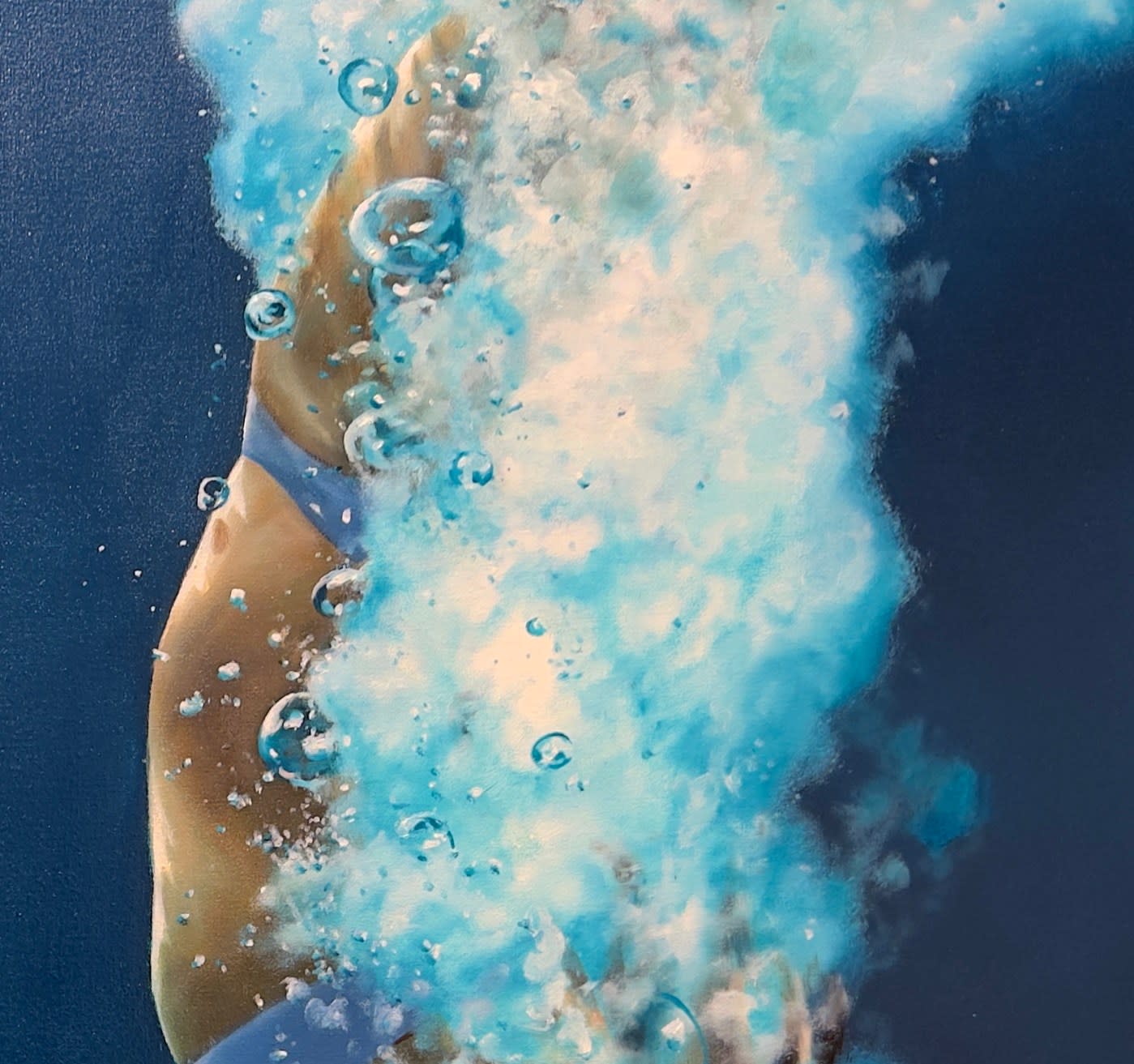 Painting of a woman diving down into water