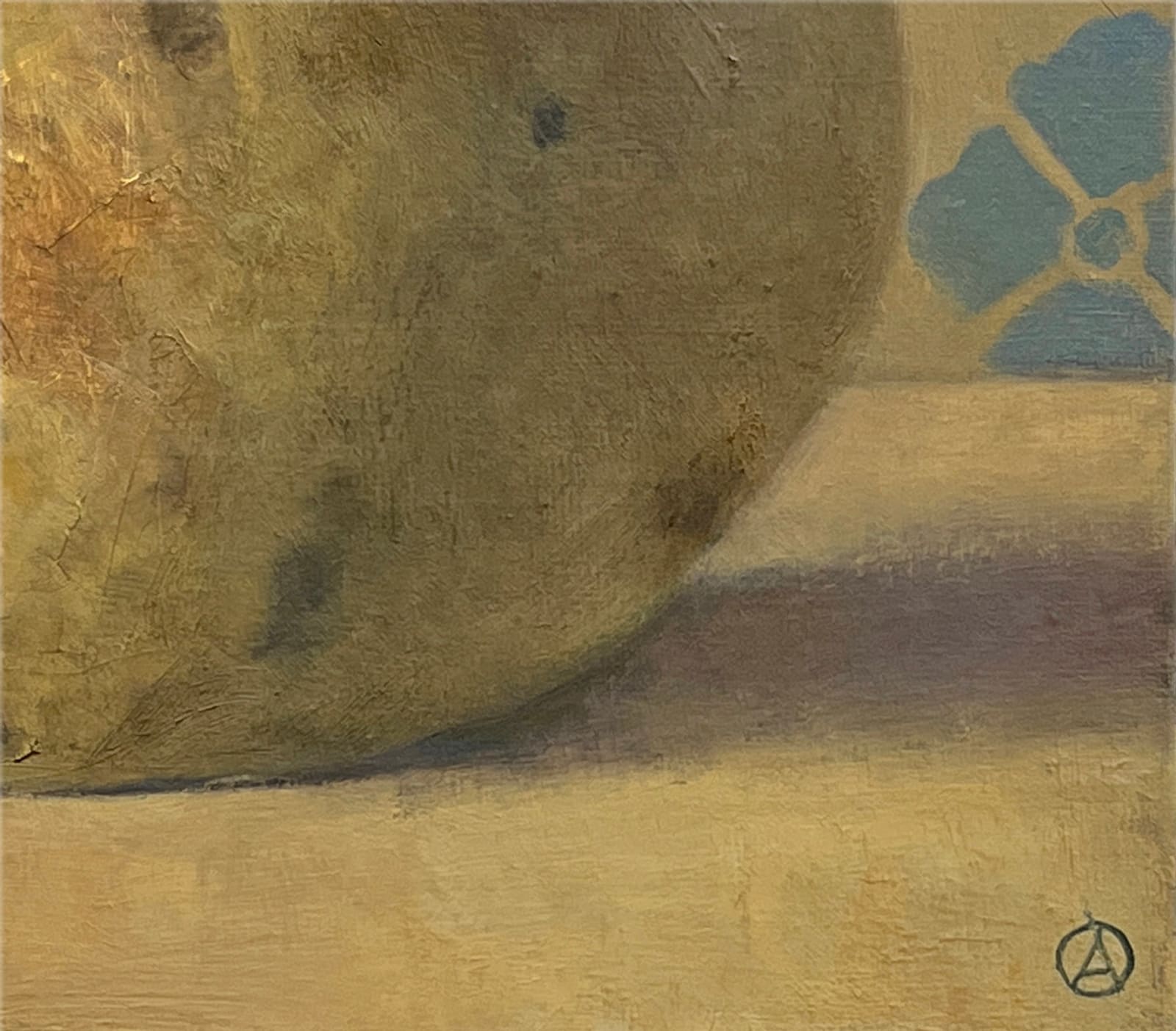 Pear sitting on table with blue design in background