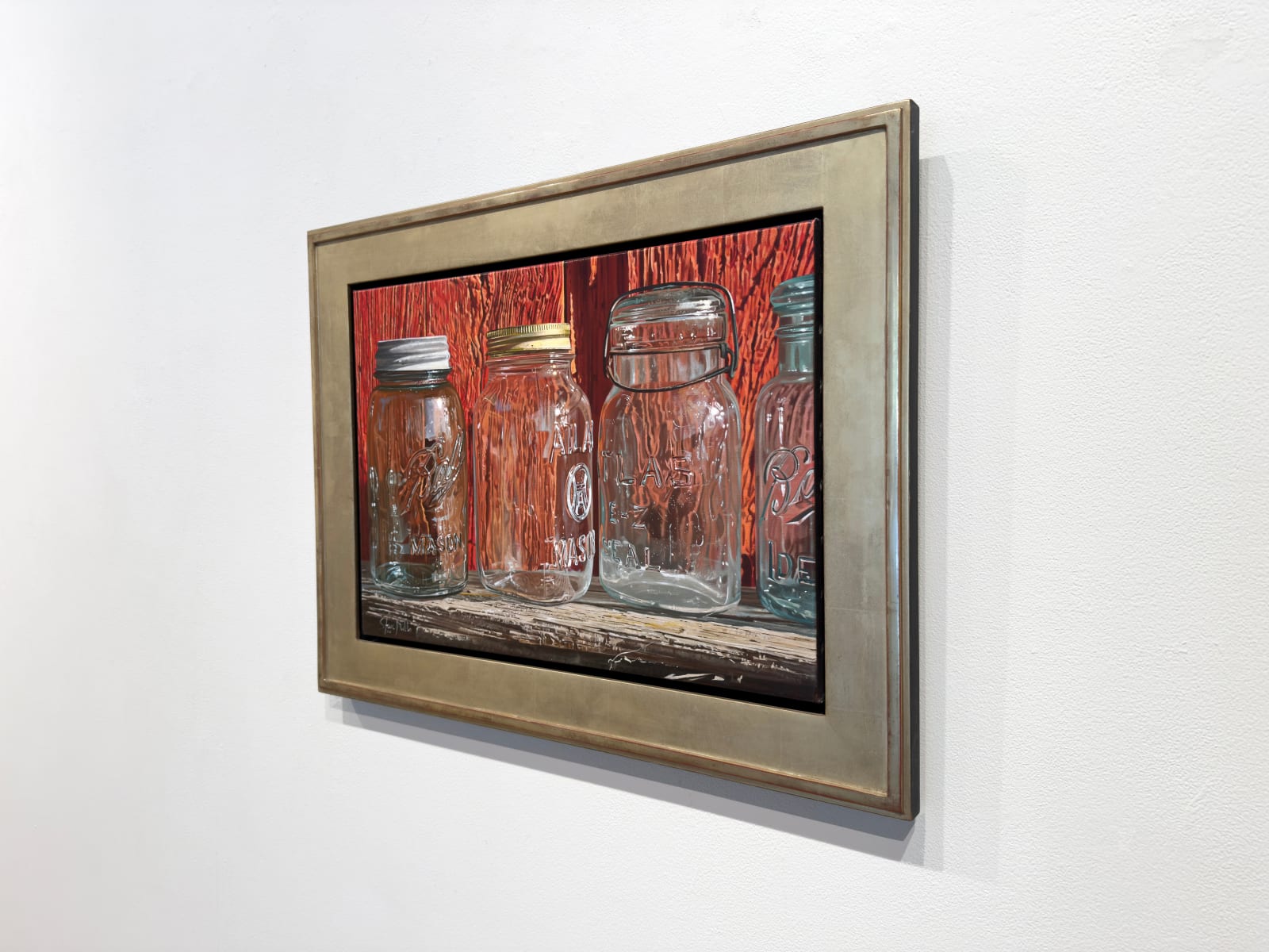 Painting of glass mason jars on a wood table in front of a red wall