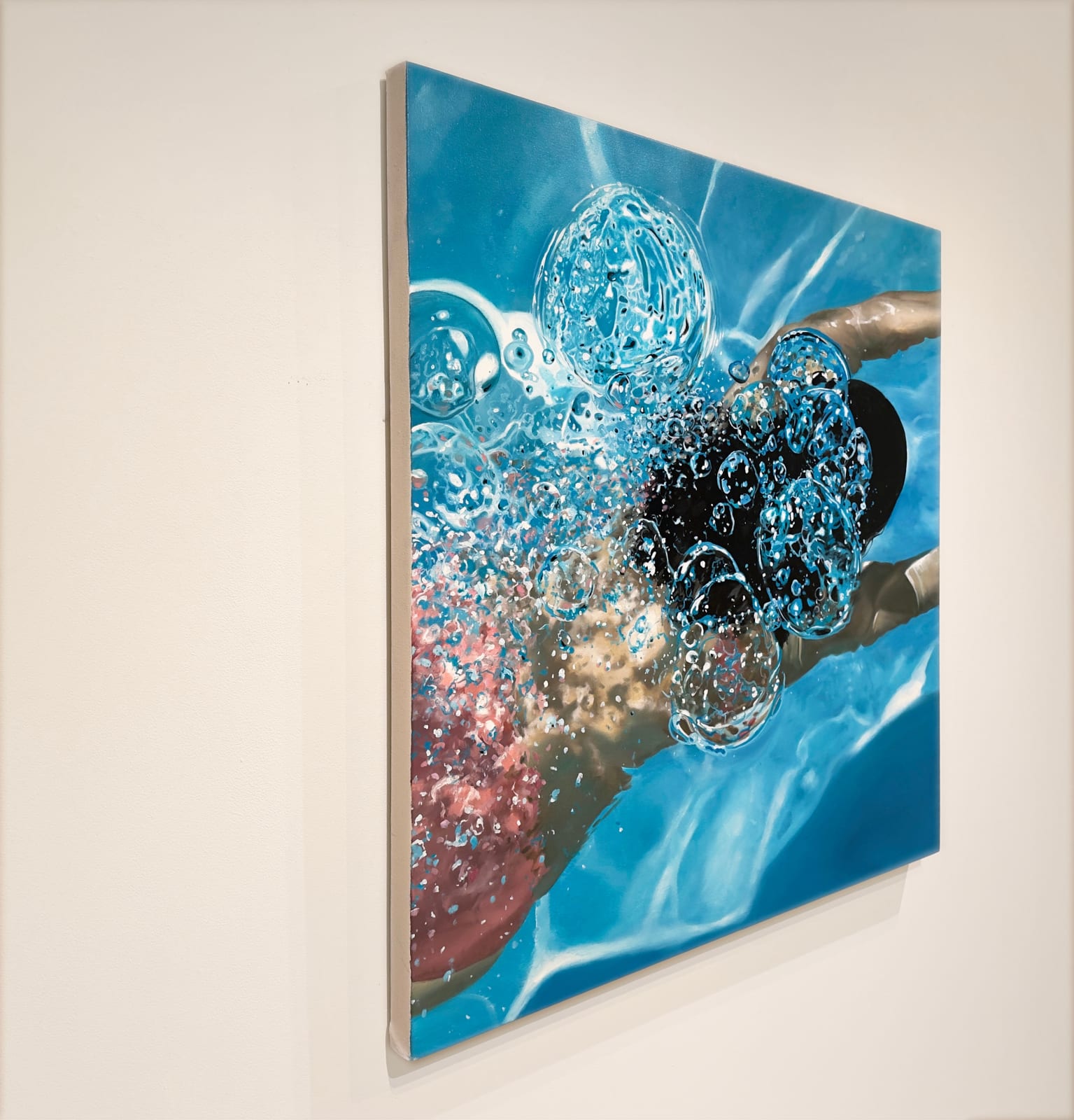 Painting of a woman swimming under water