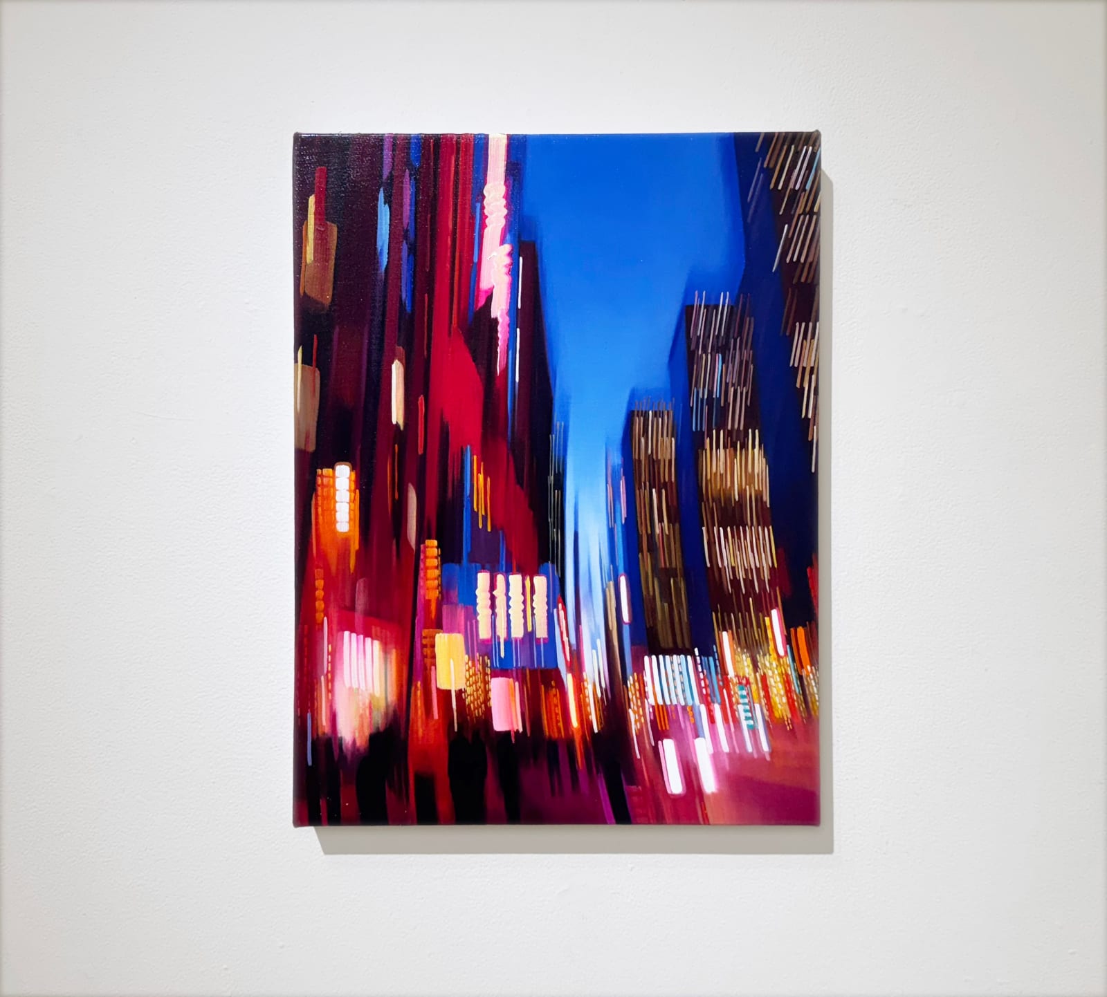 Cityscape painting with blurred lights