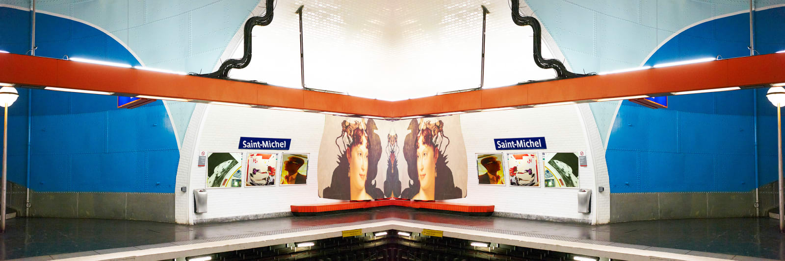 blue and red design in Saint-Michel subway by Laurie Victor Kay