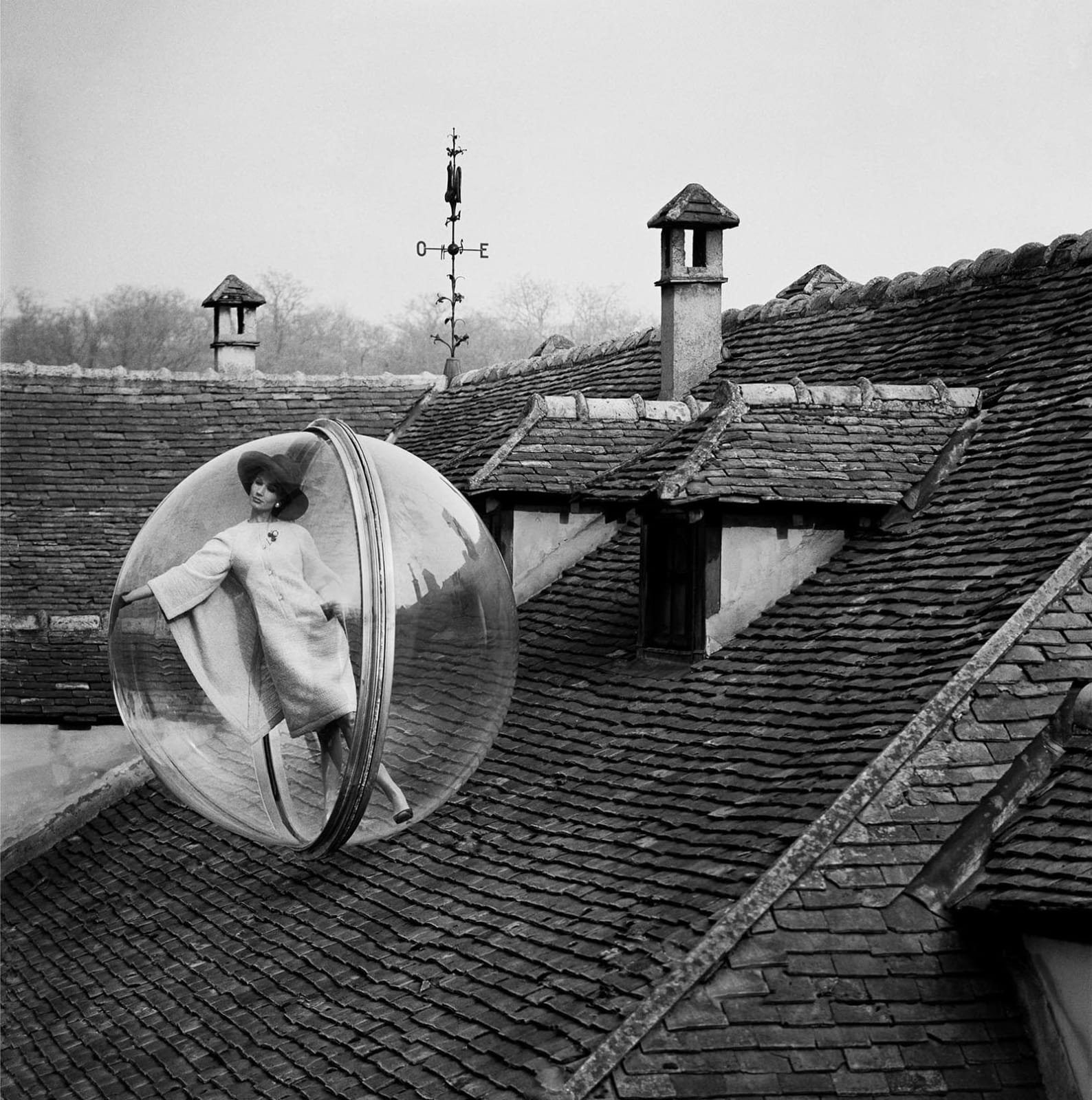 Paris bubble series Melvin Sokolsky woman on roof buy here Gilman Contemporary Sun Valley art gallery