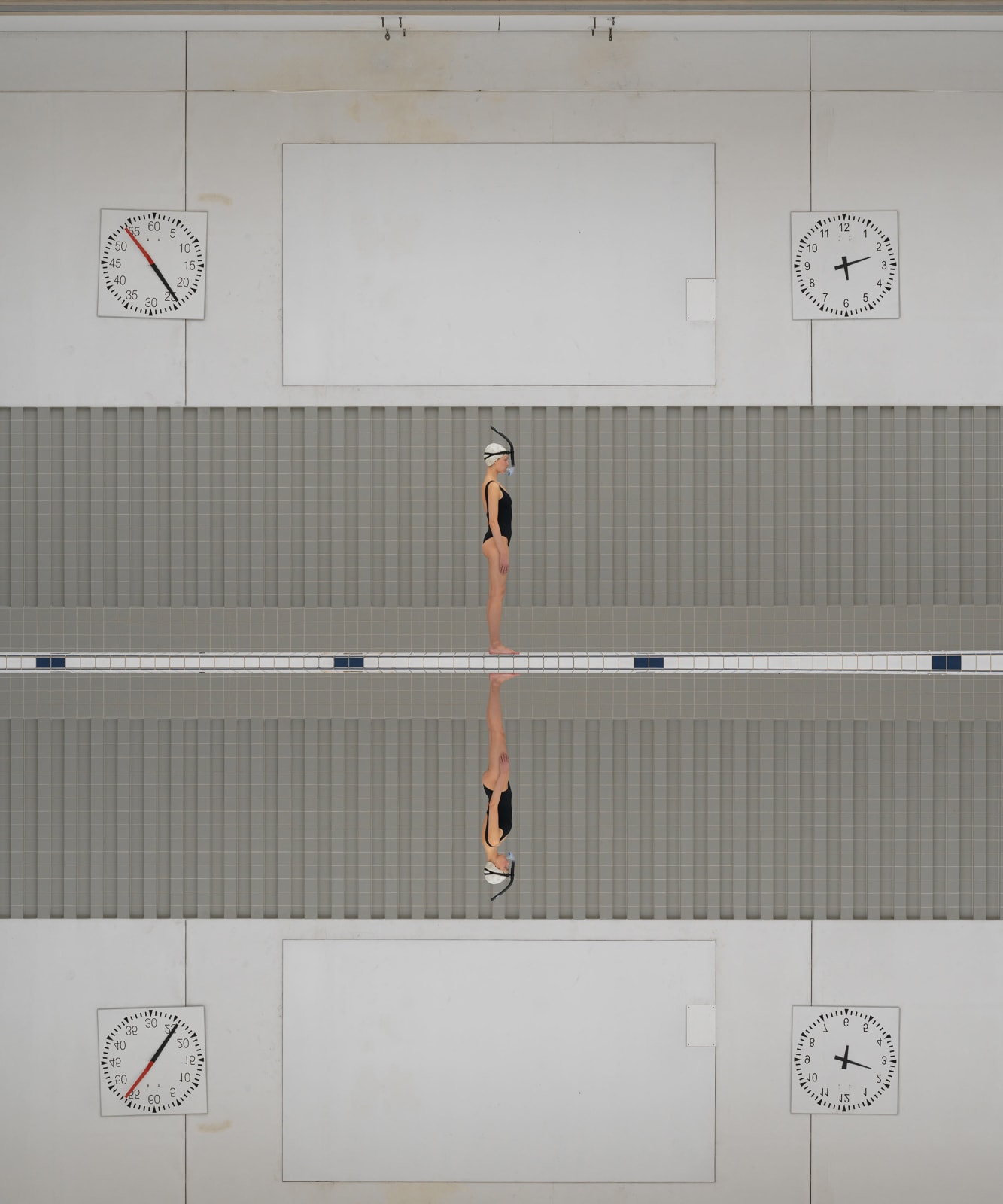Maria Svarbova Photograph of swimmer in black swimsuit with snorkel grey background available at Gilman Contemporary